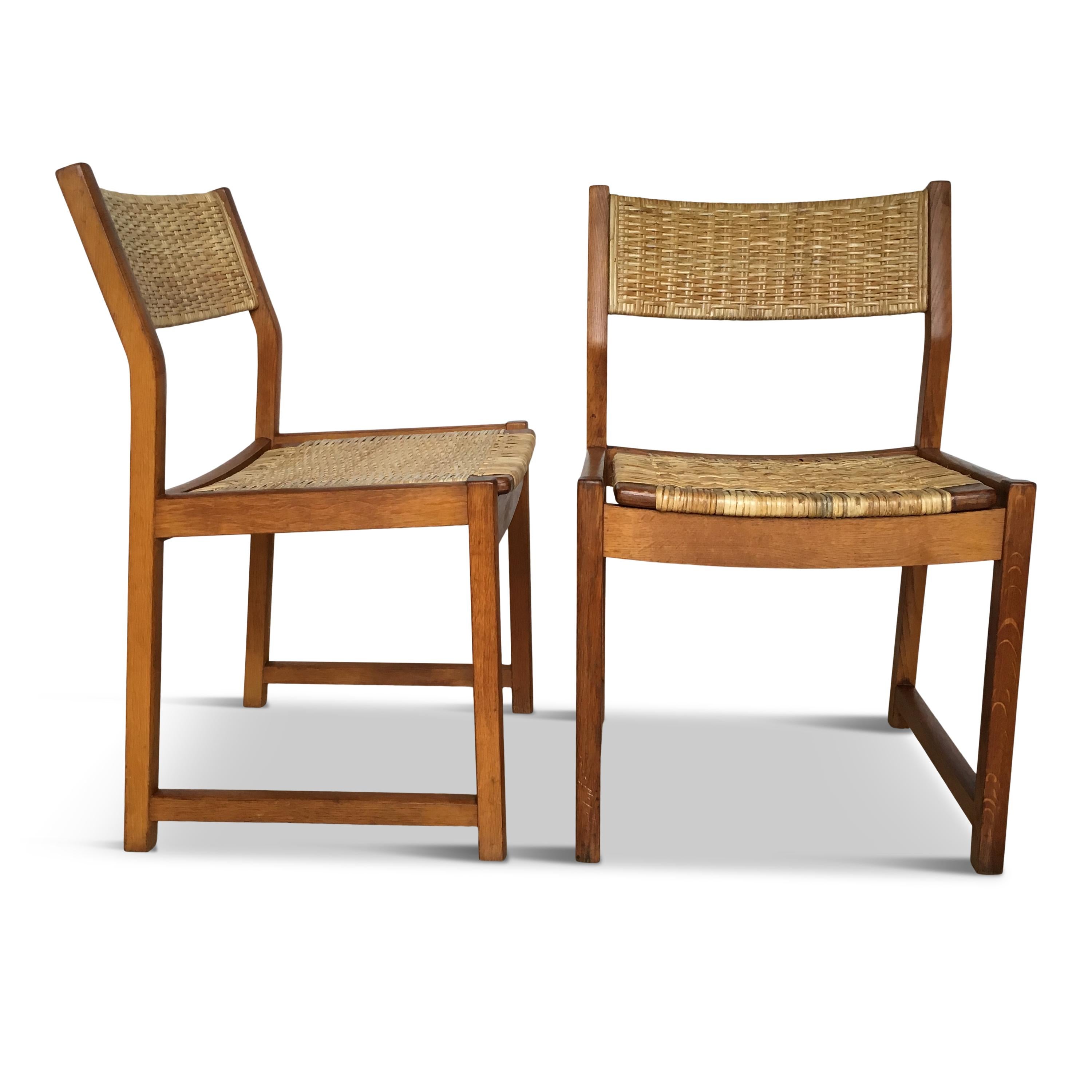 - set of two solid oak chairs with wicker seats dated to 1960
- large and comfortable mid-century dining room chairs or side chairs
- these chairs colour is well combined with teak furniture
    