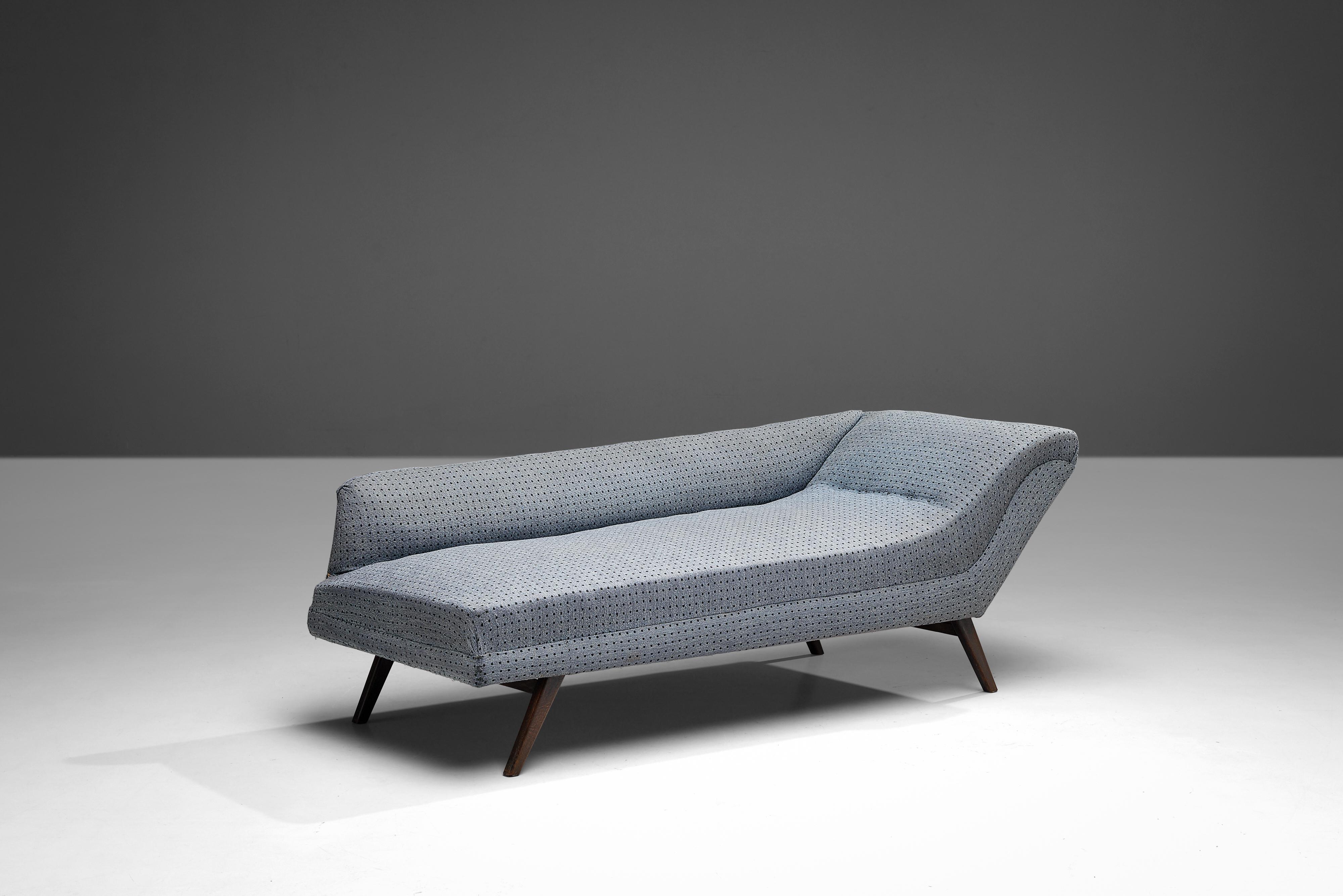 Chaise Longue, beech, upholstery, Denmark, 1960s

The frame of this stunning chaise longue illustrates a solid construction of clear lines and round edges. Yet the upholstery has little black dots placed evenly next to each other, giving this