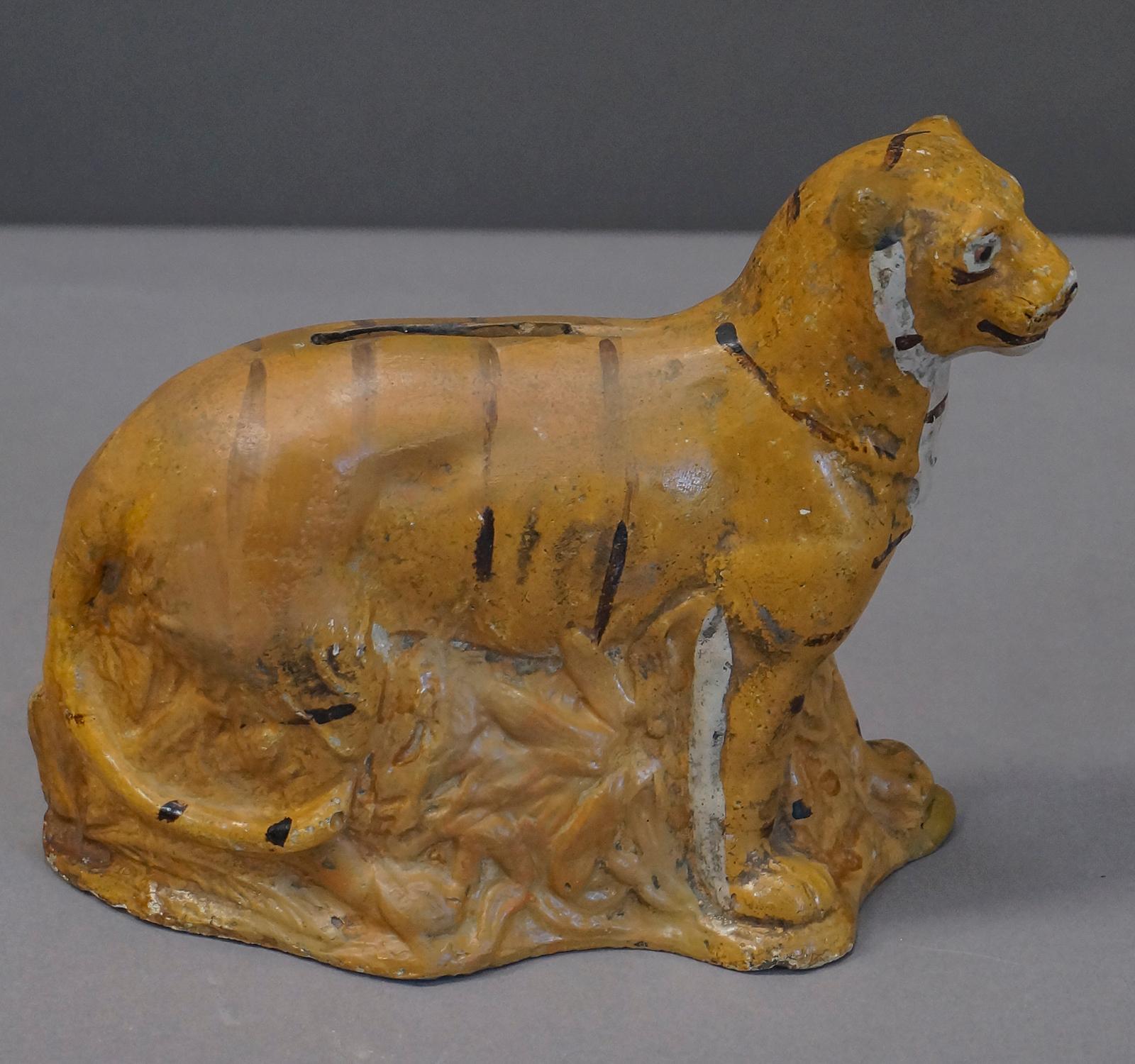 Chalkware bank in the shape of a tiger, circa 1880, from a private collection in Denmark.