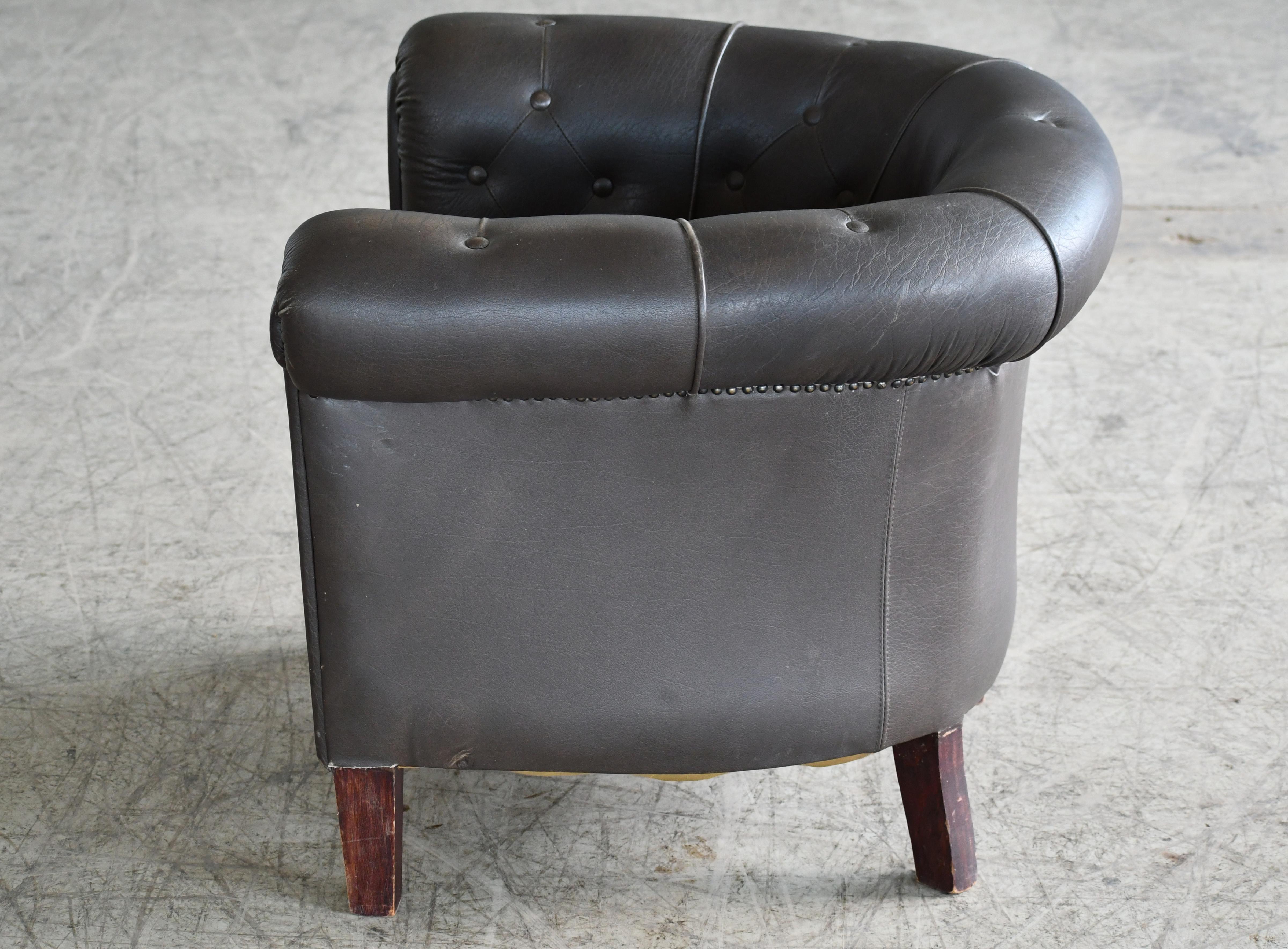 Mid-20th Century Danish Chesterfield Style Tufted Lounge Chair in Charcoal Leather, circa 1950 For Sale