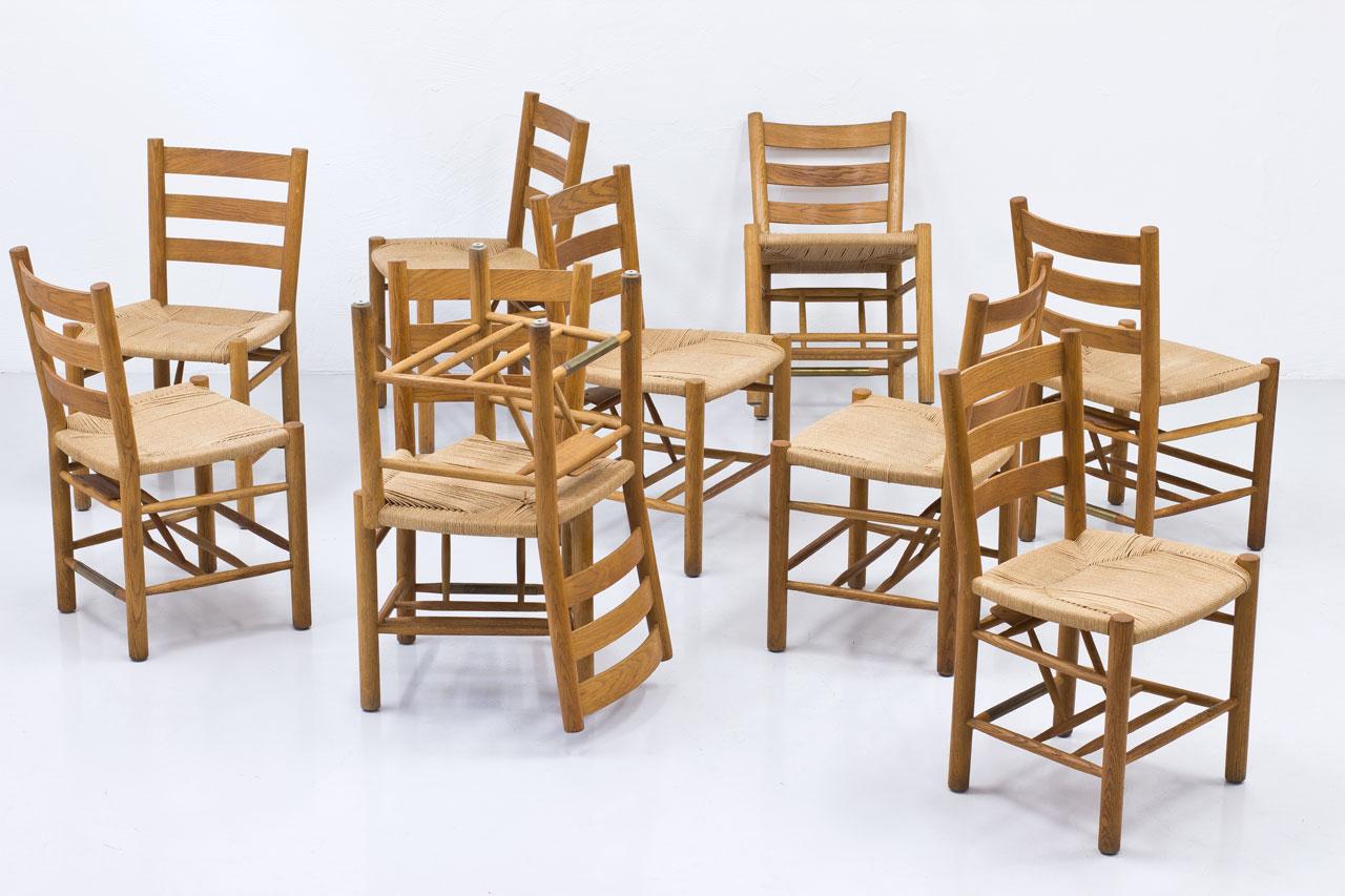 Set of ten church chairs designed by Viggo Hardie-Fischer, manufactured by Sorø Møbelfabrik in Denmark during the 1950s. 
Chair model in the manner of Kaare Klint classic of design.
Oak frame with paper cord seat.
This chair model have been
