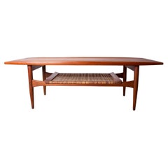 Danish coffee table, 2 levels, in Teak and Rattan by K.T. Mobler 1960.