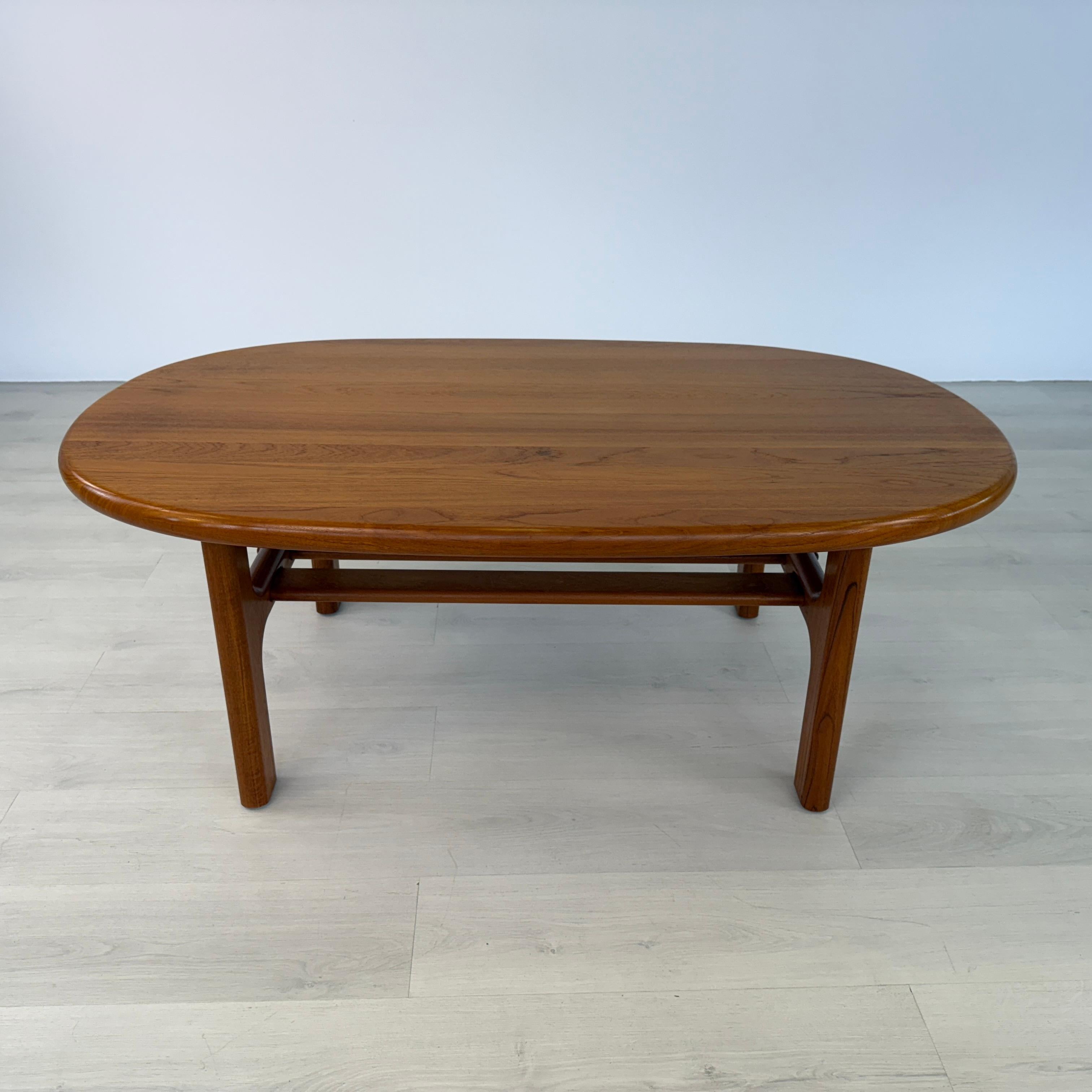 Dimensions: H 20” x W 53.5” x D 32.5”

Vintage elegant Danish teak coffee or side table with lower shelf designed by Niels Bach for Randers Möbel. Produced during 1960s this table is both timeless and functional.

Please see our other listings for