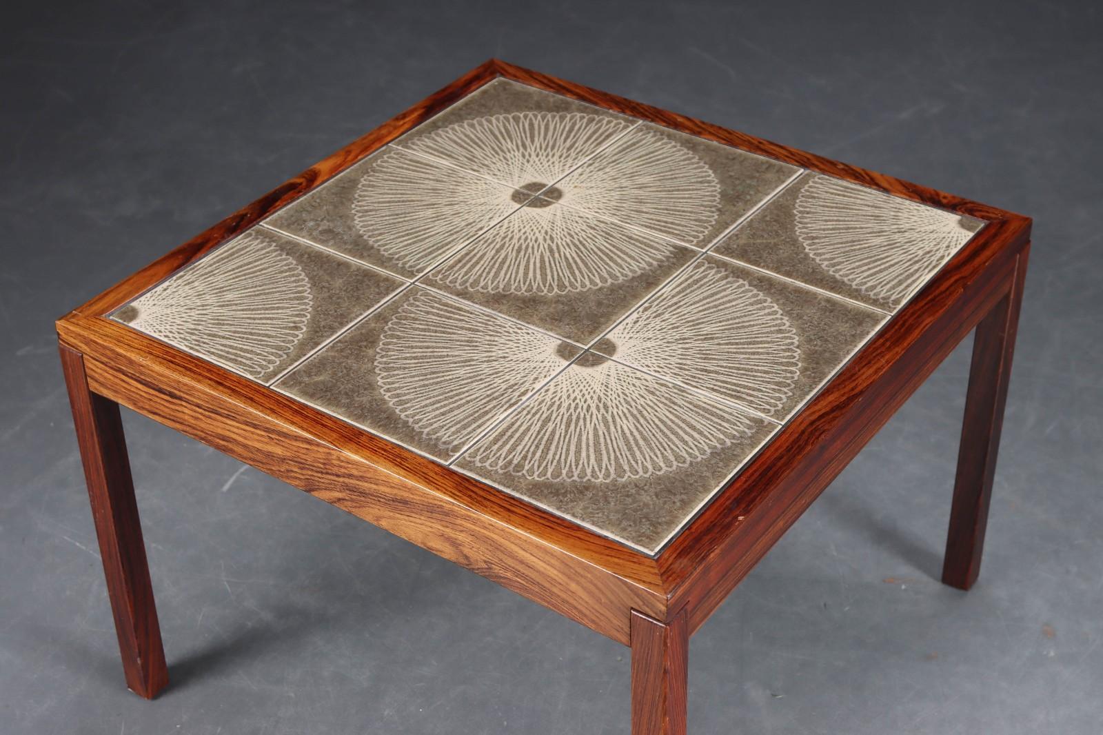 Danish palisander coffee table with ceramic tile top, circa 1960s.