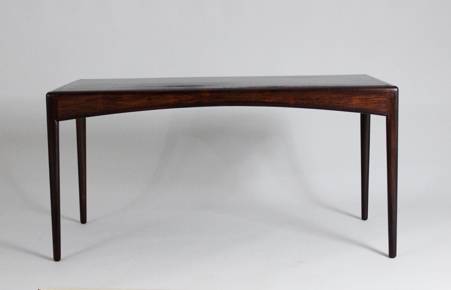 Coffee table with leather top, designed by Kristian S. Vedel in 1963. Manufactured by Søren Willadsen, Denmark. Good condition.