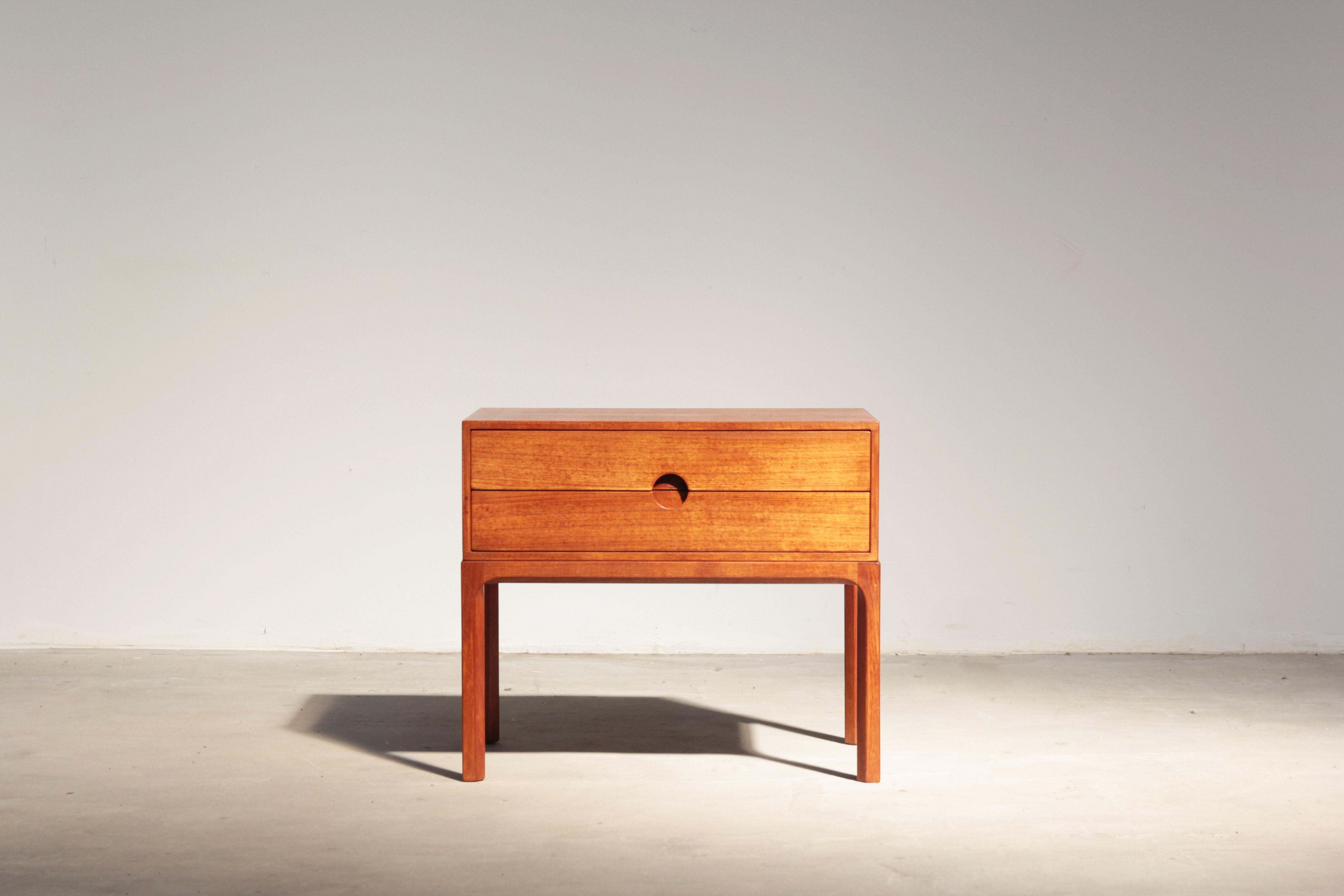 A beautiful nightstand designed by Aksel Kjersgaard in 1955 in Denmark. The nightstand is made out of teak and comes in a wonderful condition without any damages or repairs.
