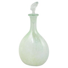 Danish contemporary glass artist. Decanter with stopper. 1990.