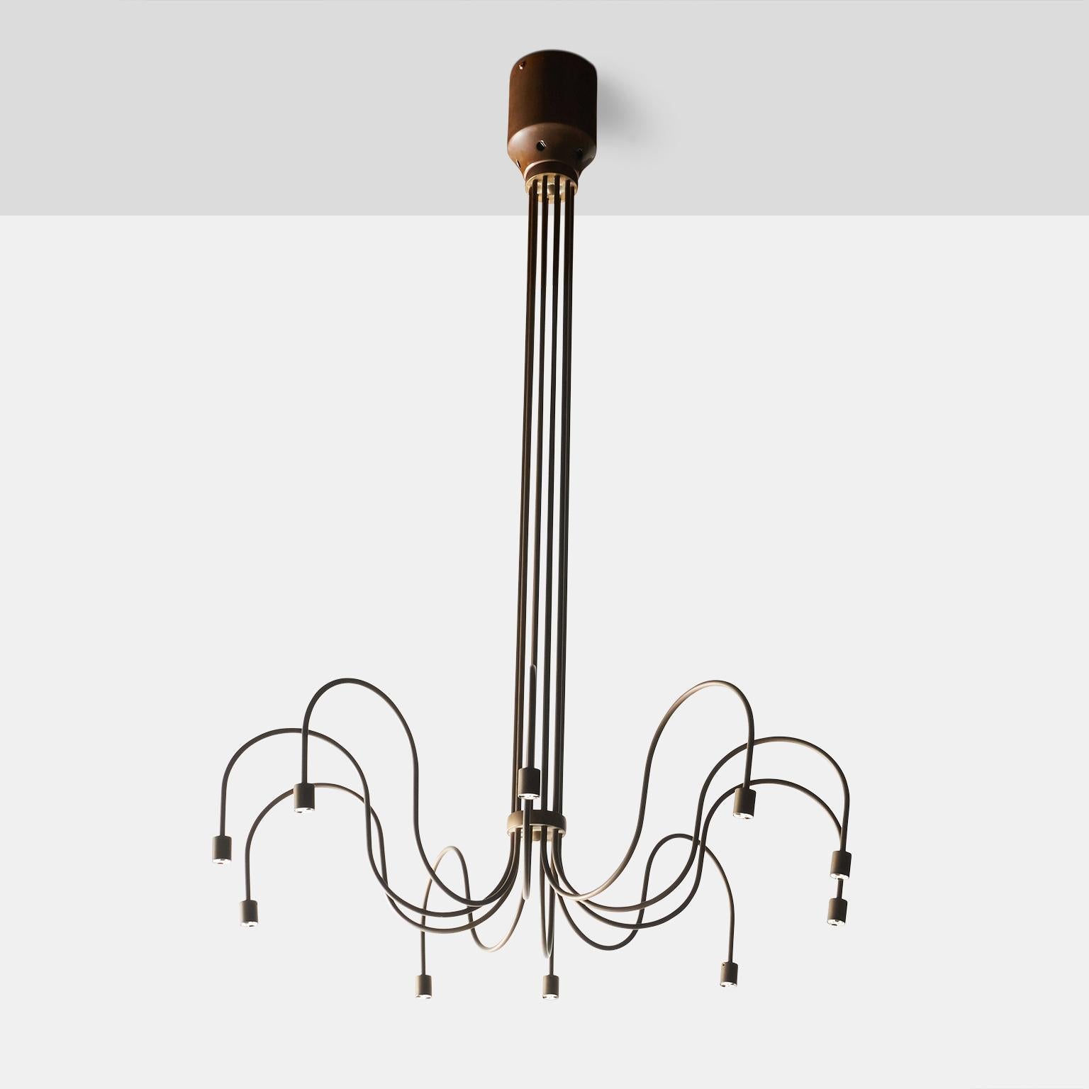 A copper chandelier with 10 LED light sockets and curved arms. 
Wired for use in US.