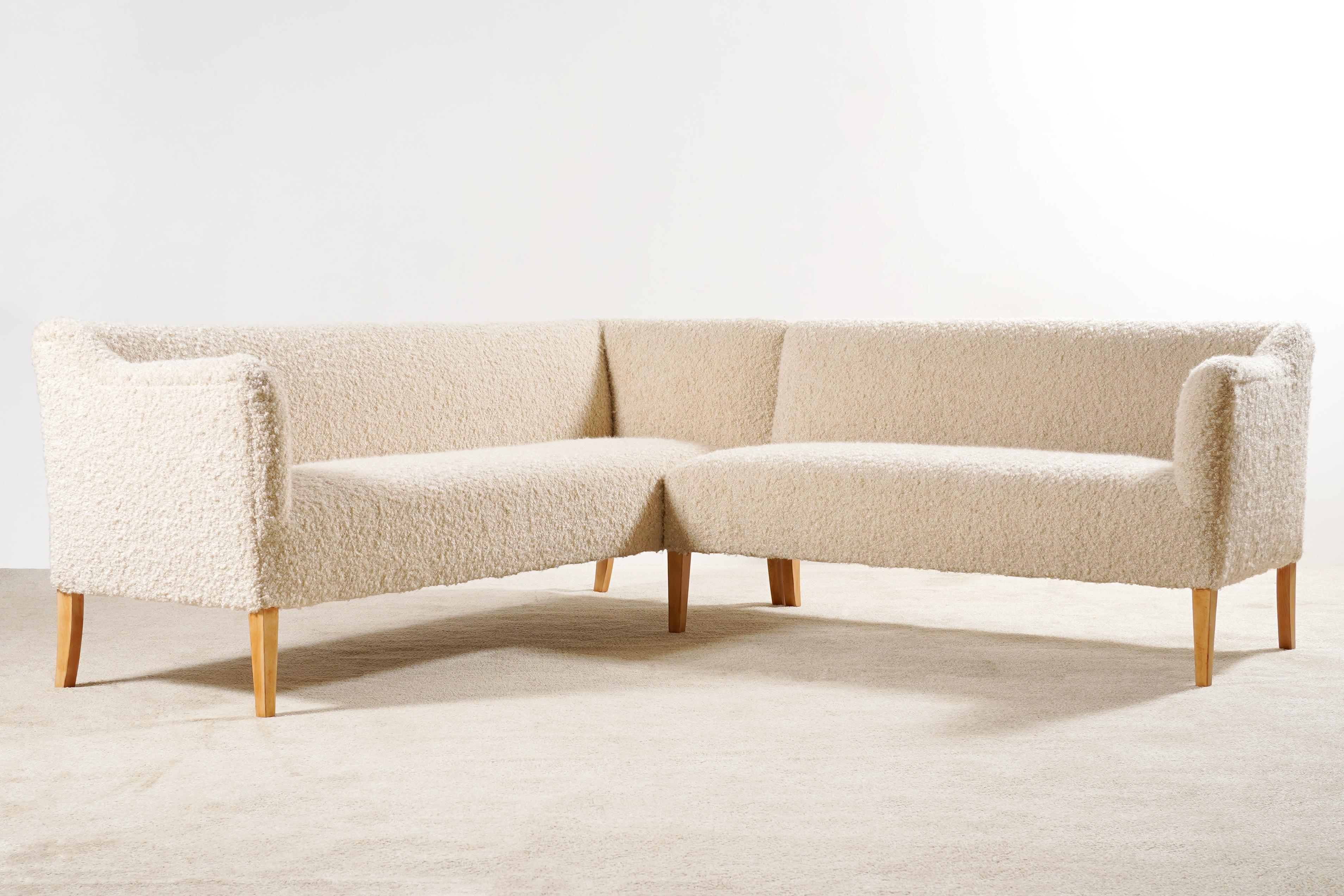 This sofa is composed of two separated parts that are placed together to form a corner sofa.
It was not designed to be placed apart as two separate elements.
Lovely shape and curves. Very comfortable seat.
Beechwood natural color waxed