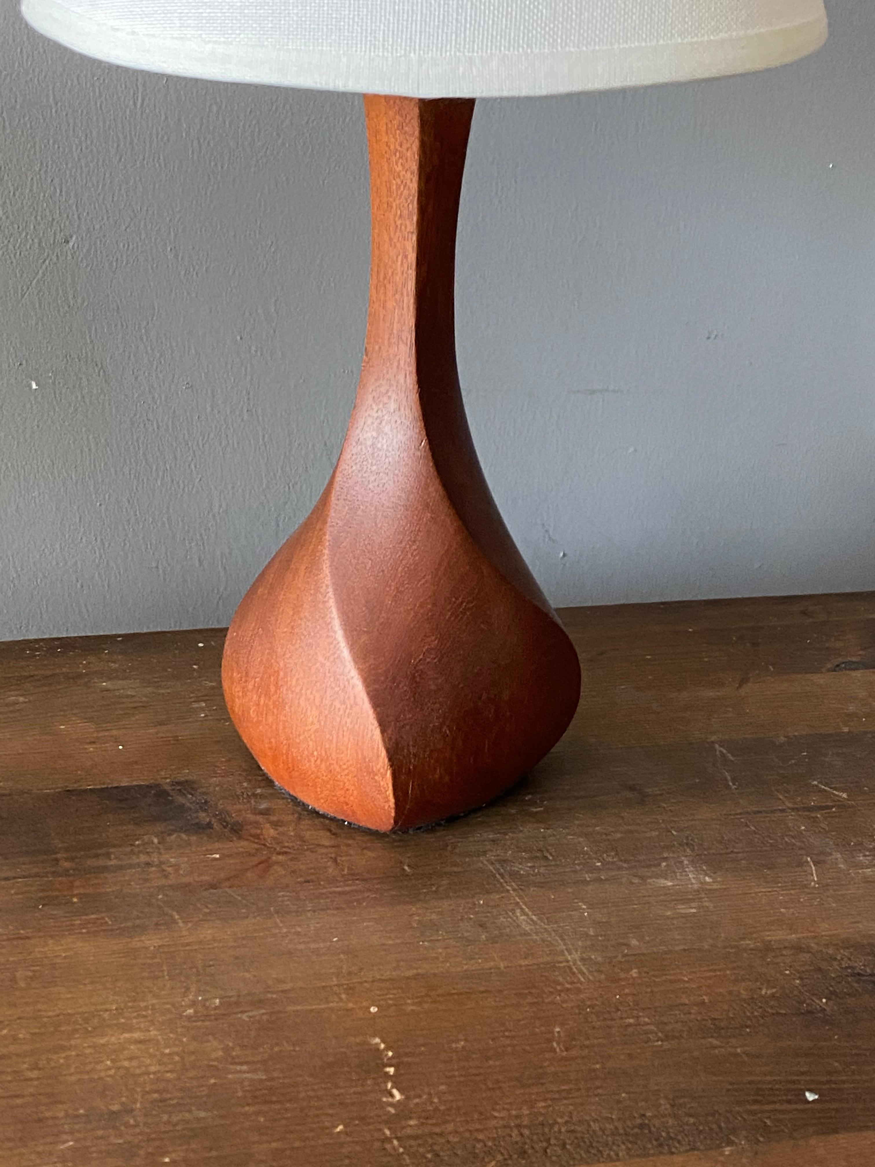 Mid-Century Modern Danish Craft, Small Modernist Table Lamp, Sculpted Solid Teak, Denmark, 1960s