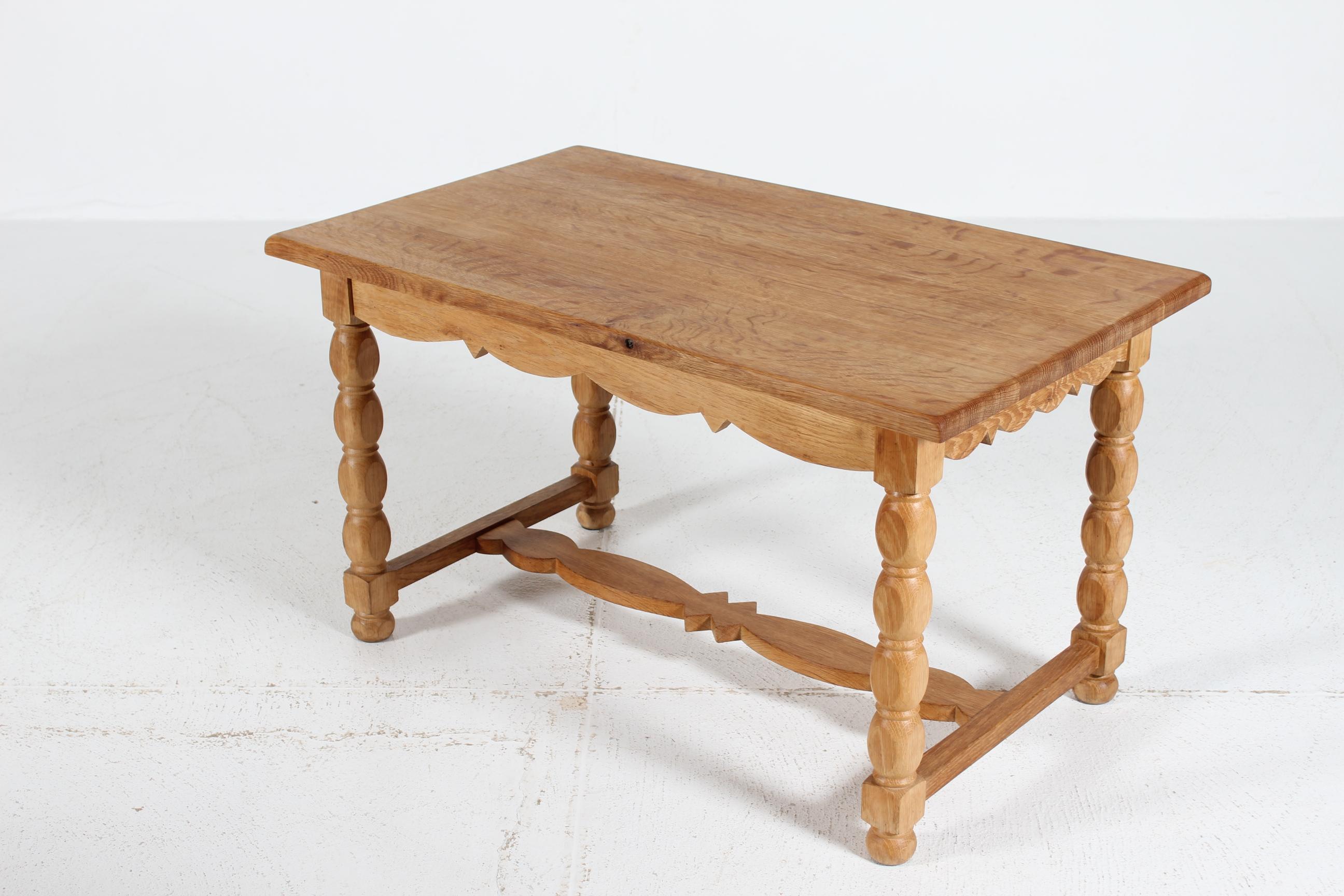 Danish oblong brutalist style coffee table with carvings made of solid oak.

Handcrafted by a Danish carpenter in the 1970s

The fine natural surface and patina with a warm glow has slowly been added after years of daily use.
There may be some small