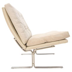 Used Danish Cream Off-White Leather Brushed Stainless Steel Base Lounge Chair