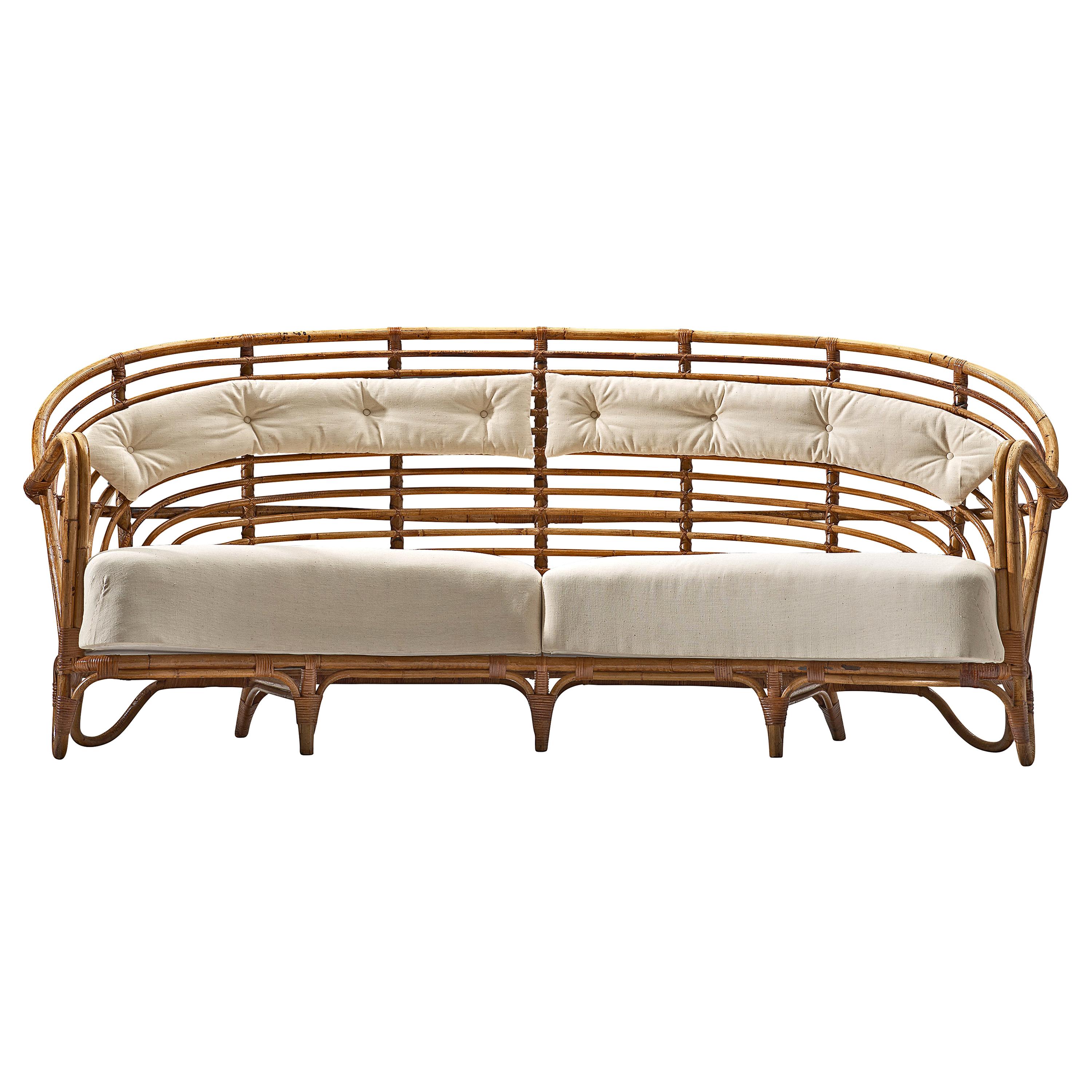 Danish Curved Rattan Sofa with Eggshell White Upholstery