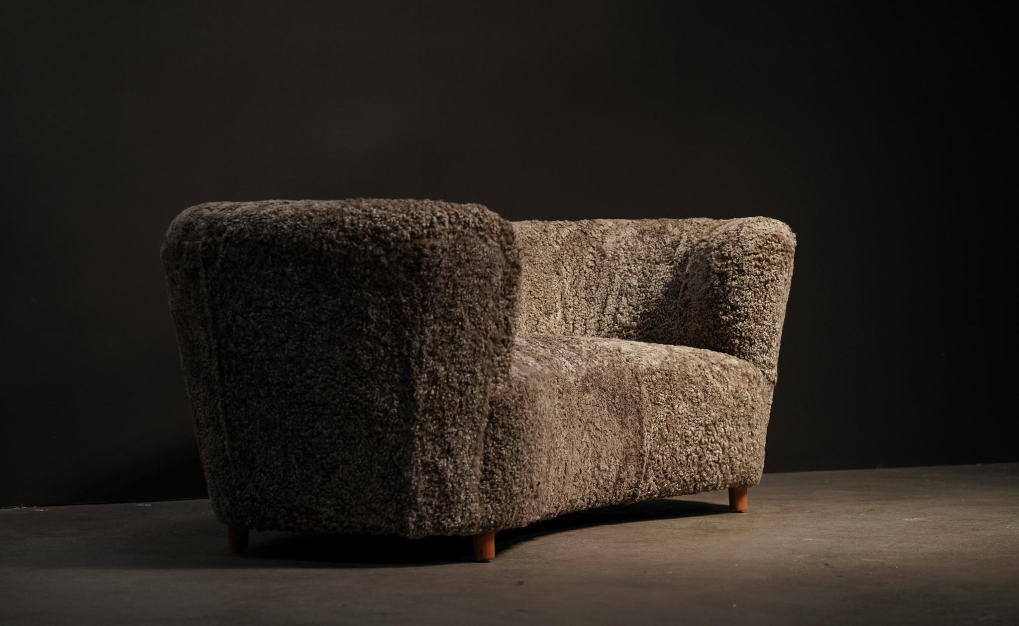 Danish Curved Sofa,  Brown Shearling
Circa, 1940's 
Denmark origin