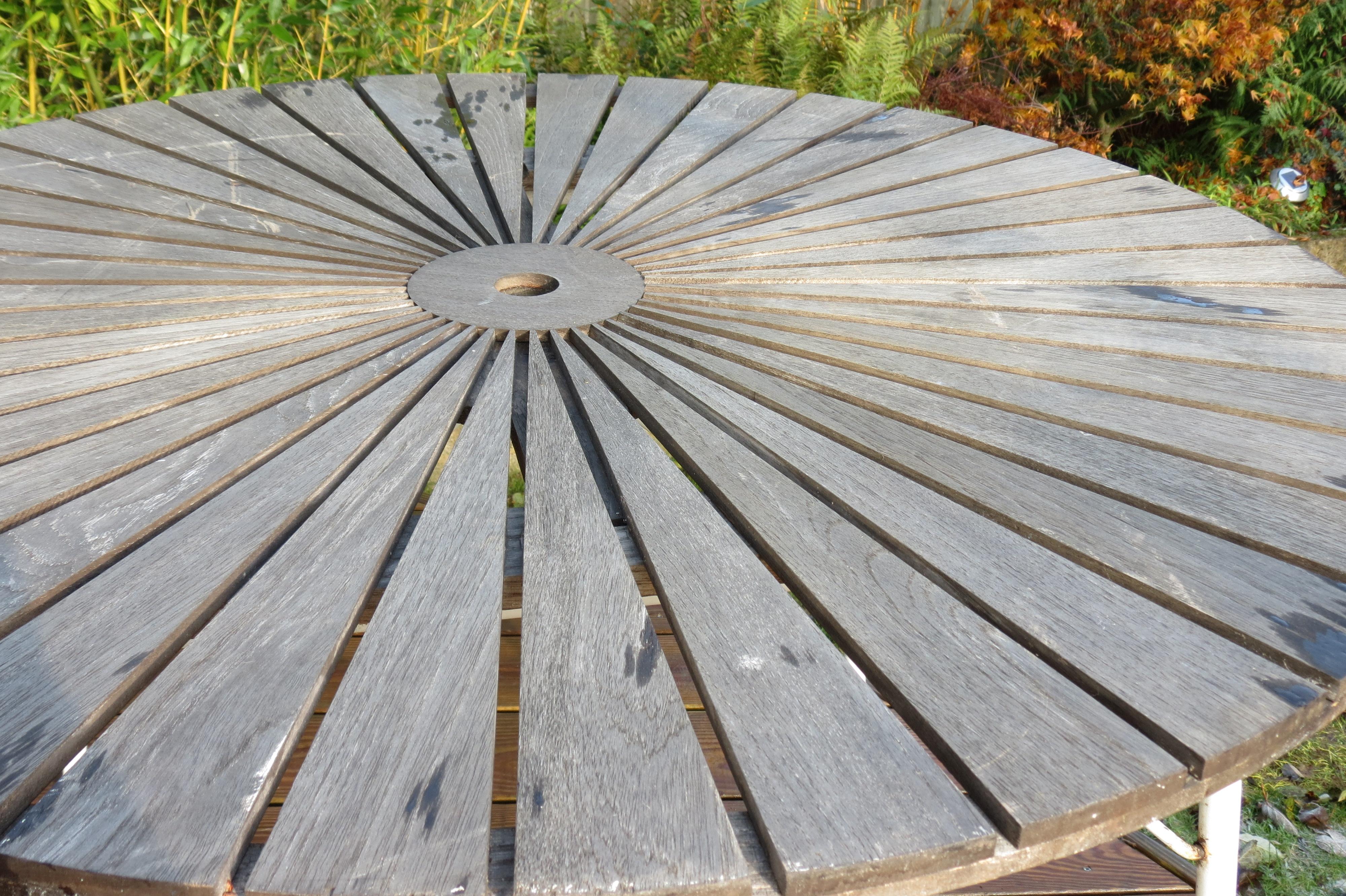 Teak garden table manufactured by Daneline, Denmark. Made from painted steel tube frames and Teak 