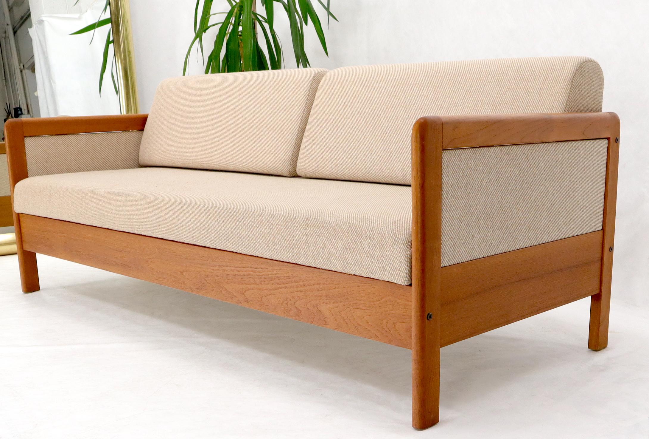 Midcentury Danish modern folding convertible sofa daybed compact clean design teak frame wool upholstery.