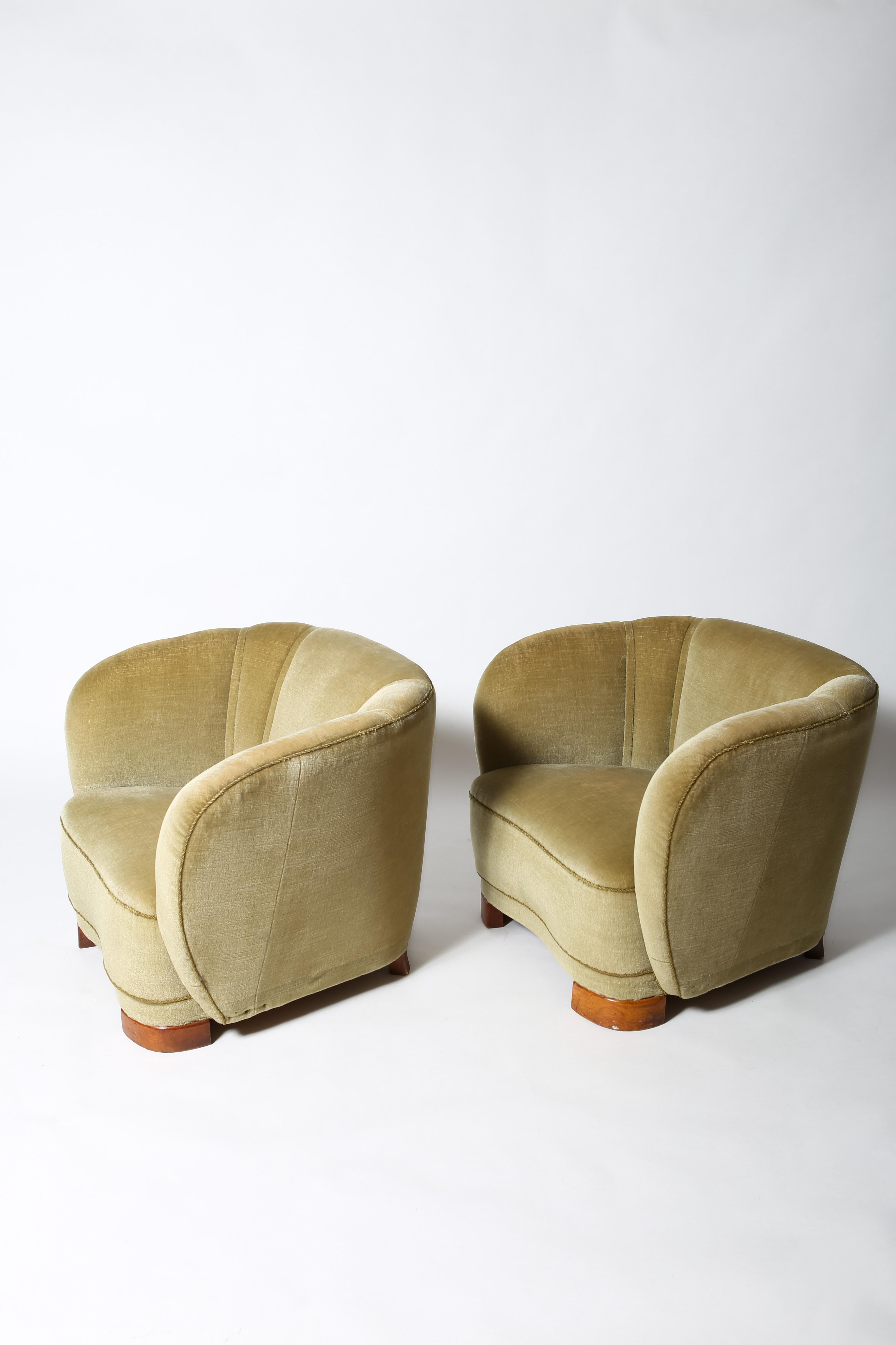 Danish cabinetmaker art deco club chairs. Wonderful curves; original mohair velvet upholstery. Extremely well-built. Sold as pair.
