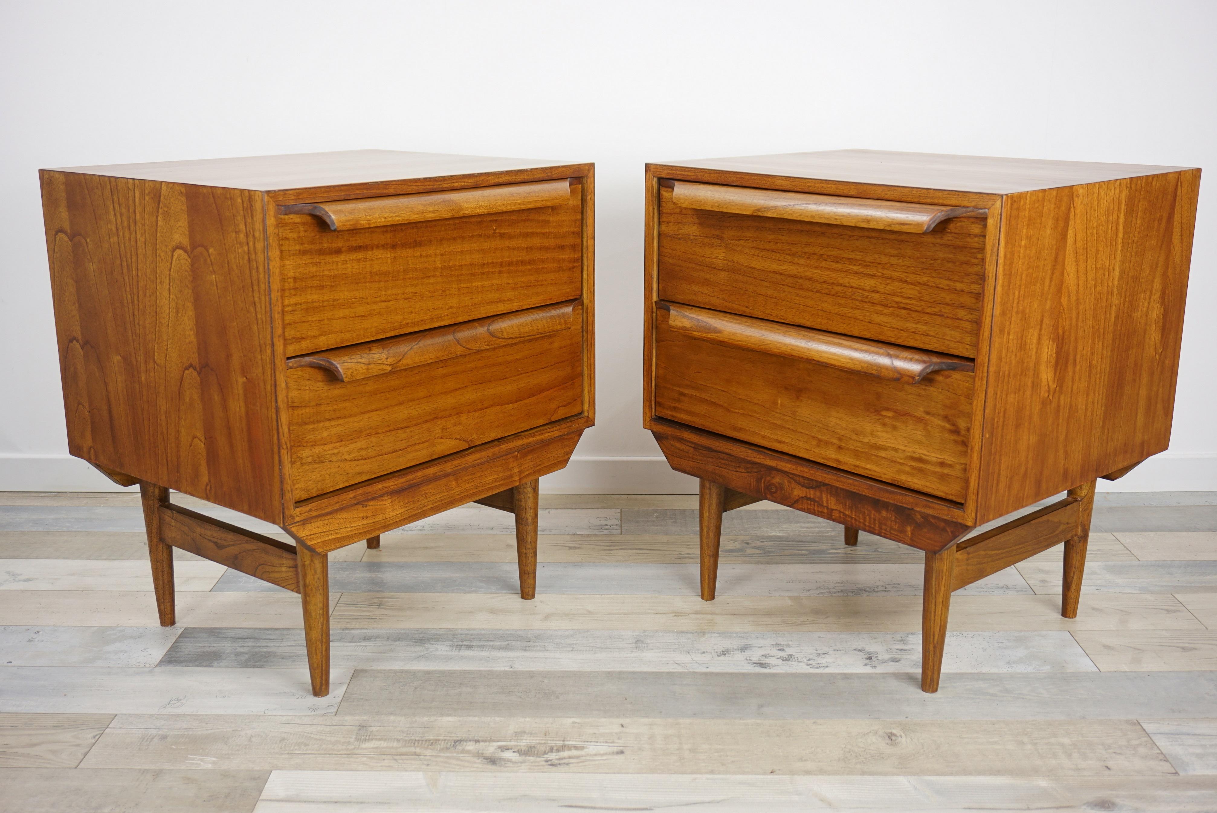 Pair of MCM style and Danish design bedside tables all in wood, sculpted handles, compass feet, two drawers. All in excellent condition (new items, never used).