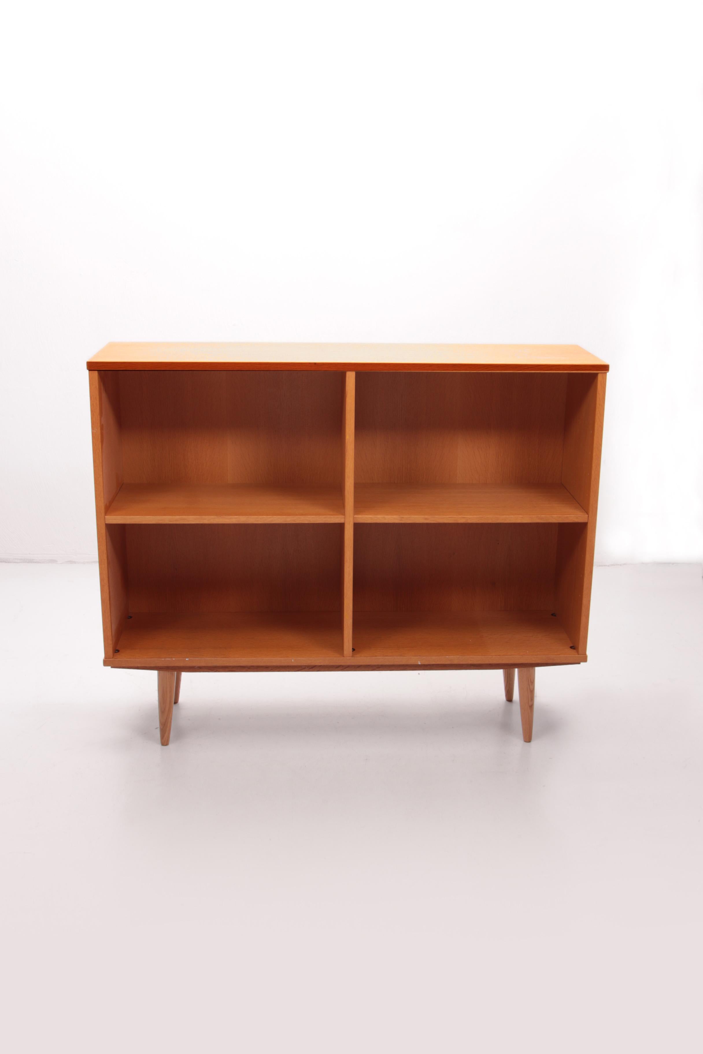 Danish design bookcase made by Poul Hundevad, 1960, Denmark.


This sturdy and solid bookcase from the Hundevad brand is in very beautiful condition. This stylish sideboard and bookcase made of light oak veneer was designed in the 1960s by Carlo