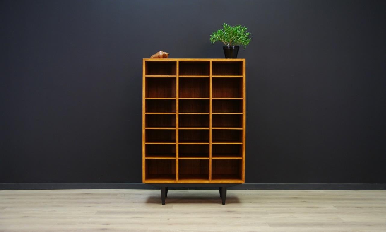 Great cabinet from the 1960s-1970s, minimalist form, Danish design. Furniture finished with teak veneer. Plenty of adjustable compartments. Preserved in good condition (small bruises and scratches, filled veneer loss) - directly for