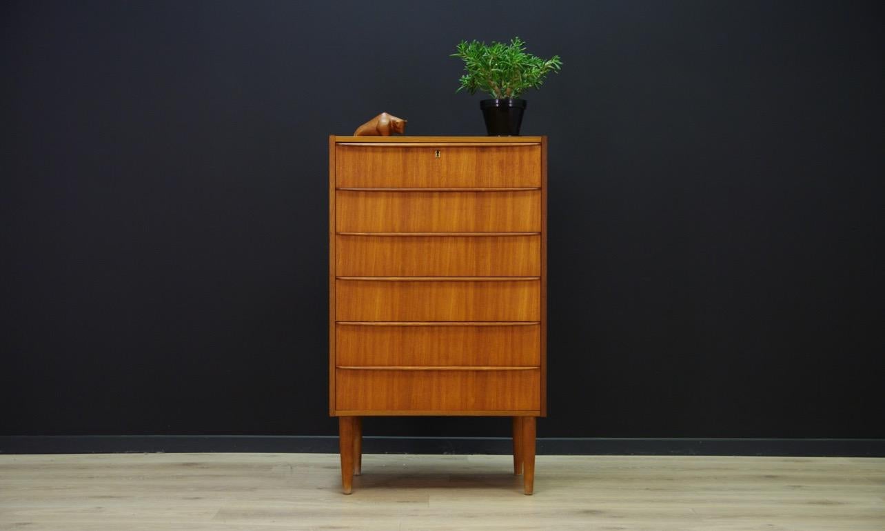 Classic cabinet from the 1960s-1970s, Minimalist form - Danish design. Six capacious drawers, veneered with teak. Preserved in good condition (small dings and scratches) - directly for use.

Dimensions: height 103 cm, width 84 cm, depth 39.5 cm.