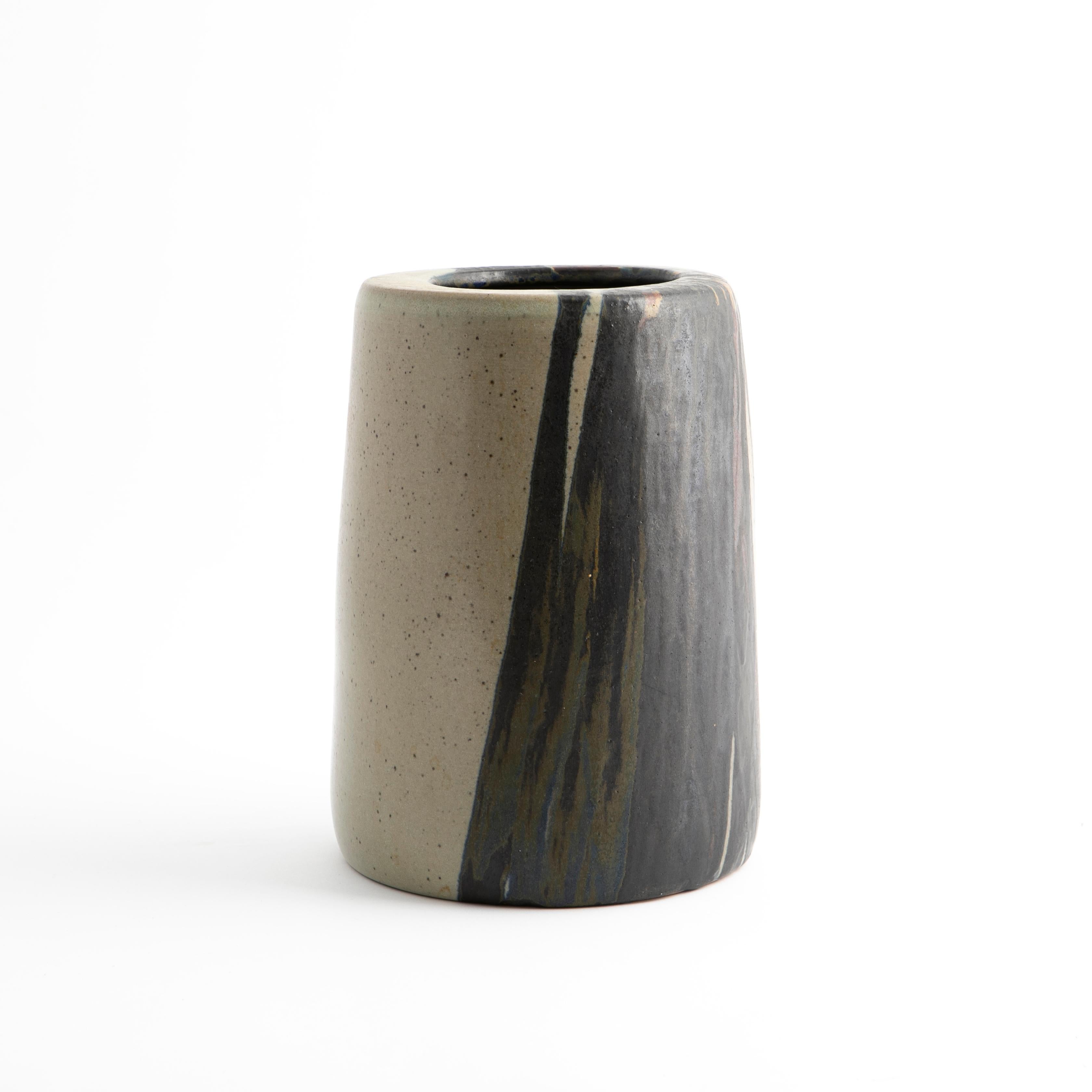 Jacob Bang, Danish 1932-2011
Unique vase in glazed stoneware. Beautiful glaze in shades grey, white, black and earth tones.

Signed Jacob Bang 1970

Jacob Bang was a Danish ceramicist, designer and sculptor and the son of ceramic artist Arne