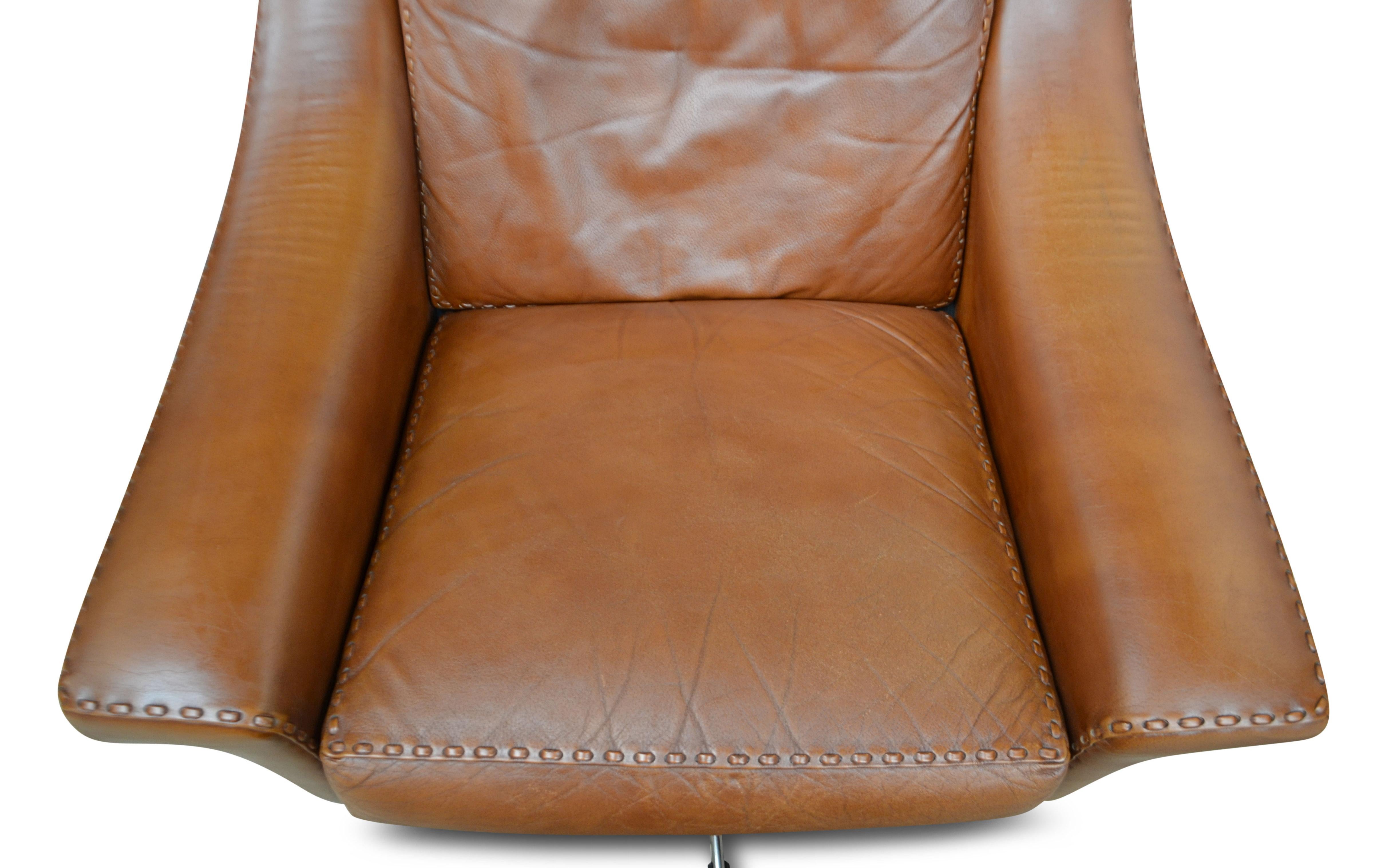 Mid-20th Century Danish Design Leather Swivel Chair and Ottoman by Aage Christiansen