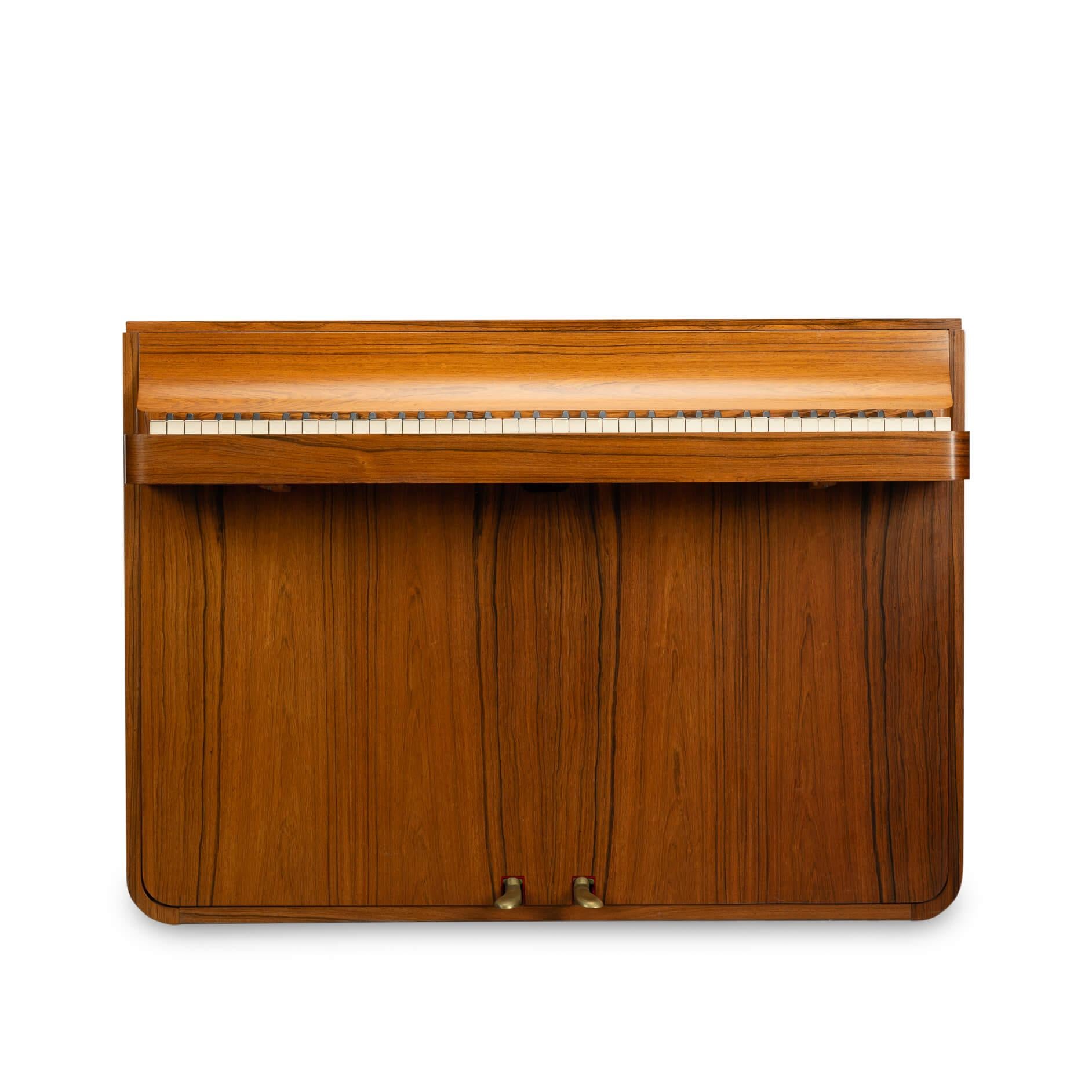 Danish design
A rare Danish midcentury pianette made of magnificent rosewood. It is called pianette due to the 82 keys rather than the standard 88 of a full size piano. This pianette is made by renowned piano maker Louis Zwicki. Every piano from