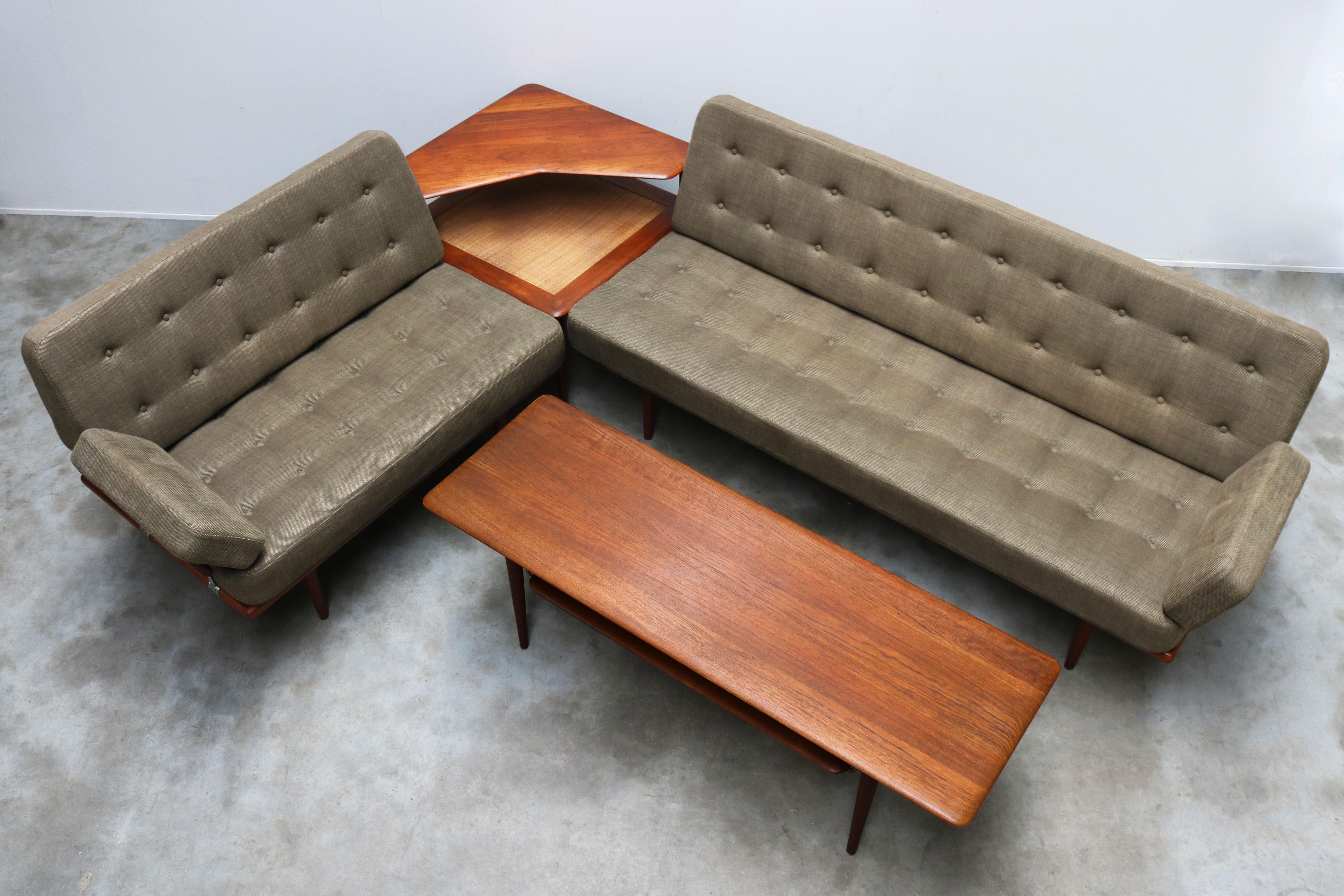 Extremely rare & stunning! This fully original ''Minerva seating group'' by Peter Hvidt & Orla Mølgaard-Nielsen for France & Daverkosen 1950. 
The design & luxurious feeling of this set are just superb. The combination of teak, rattan, wool &