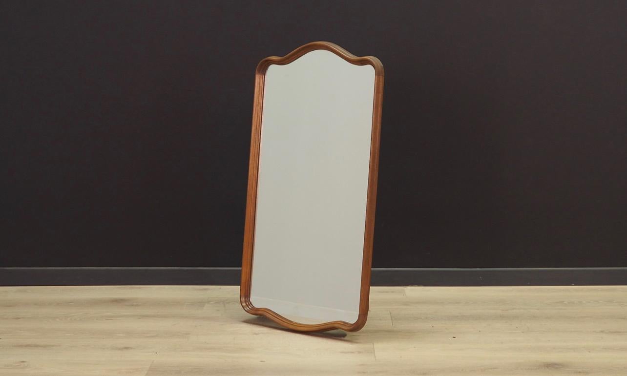 Mirror from the 1960s-1970s, Scandinavian design. Mirror made of wood, glass without scratches, with possibility of hanging. Preserved in good condition - directly for use.

Dimensions: height 81 cm, width 44.5 cm, depth 3 cm.