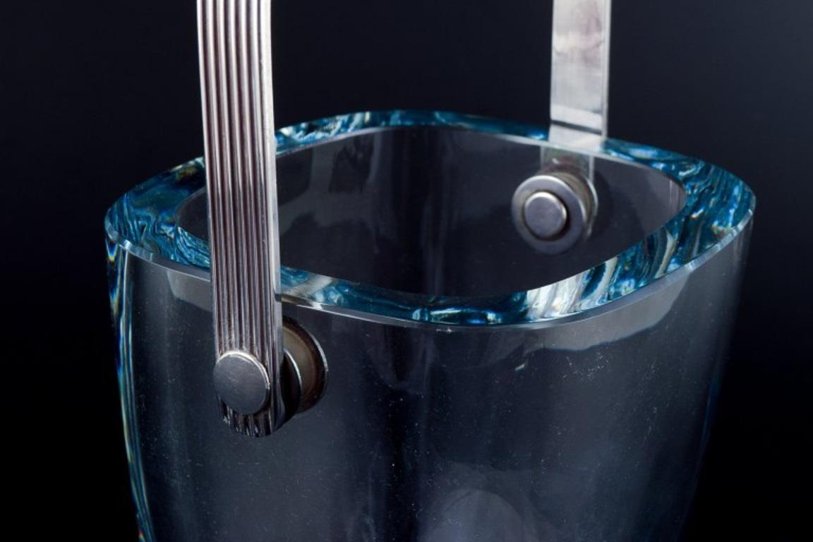 Mid-20th Century Danish design. Modernist ice bucket in art glass with a silver handle.  For Sale