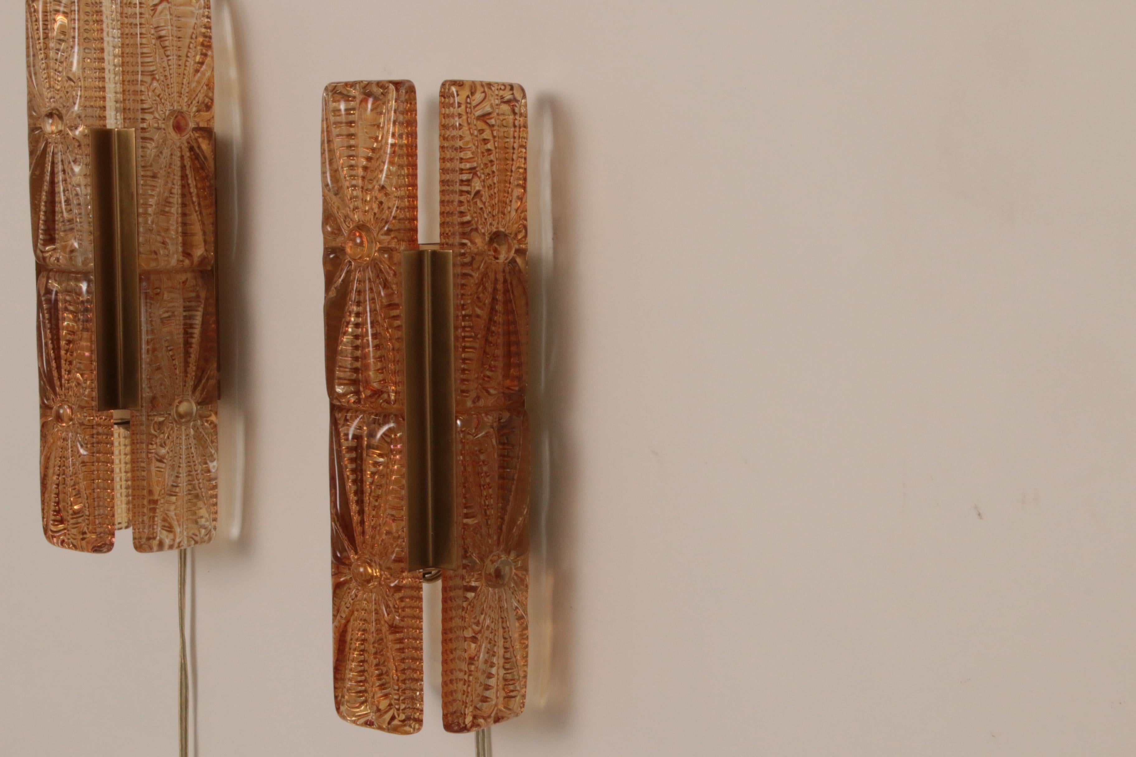The Danish Mid-Century wall lamps by Vitrika are a timeless example of Scandinavian design. Known as the 