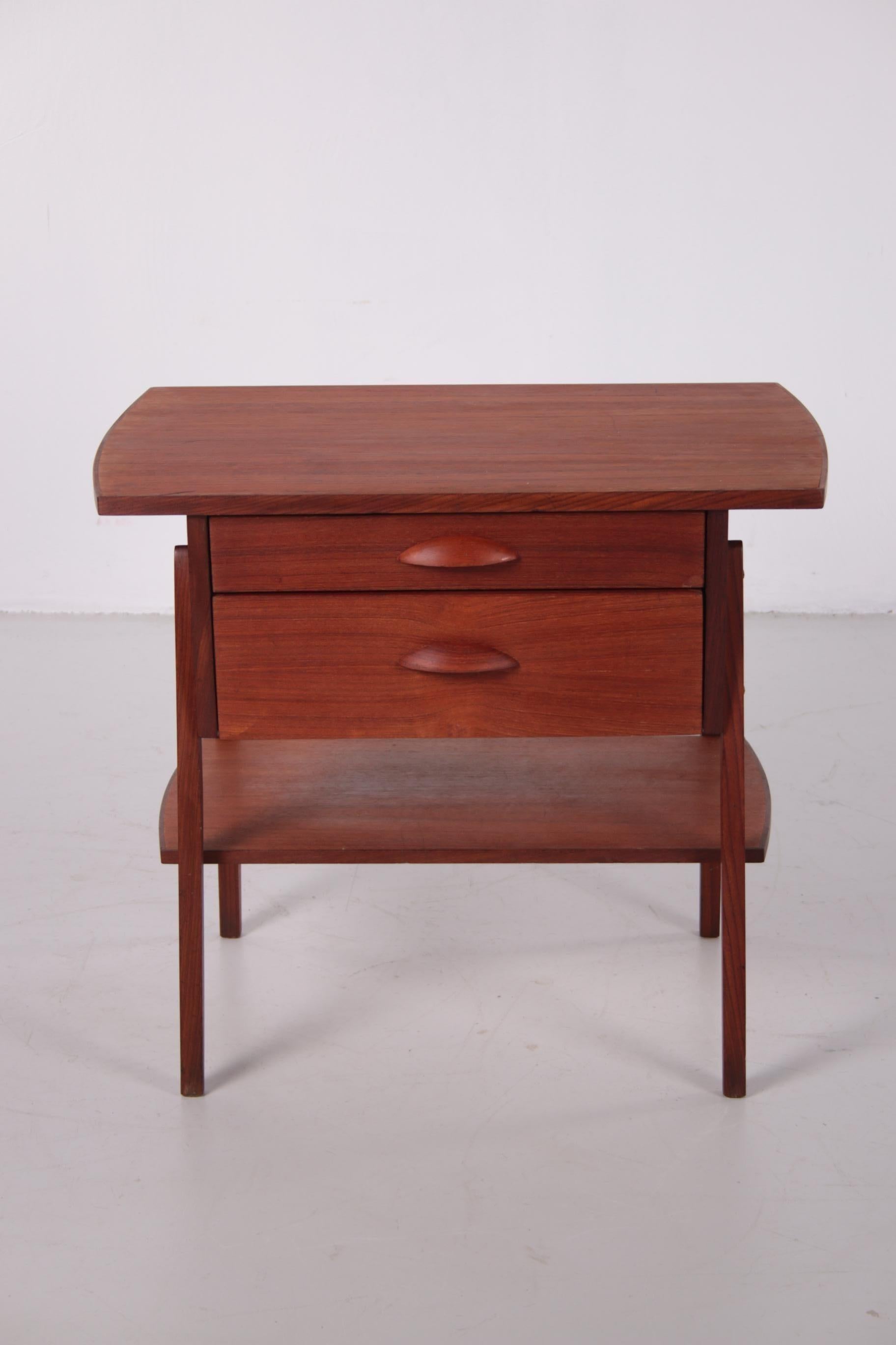 Teak vintage side table and chest of drawers from the sixties, Denmark. 
Beautiful model with round organically shaped handles and 2 large drawers. 
The top drawers there are compartments. 
The condition is perfect considering the age, it is