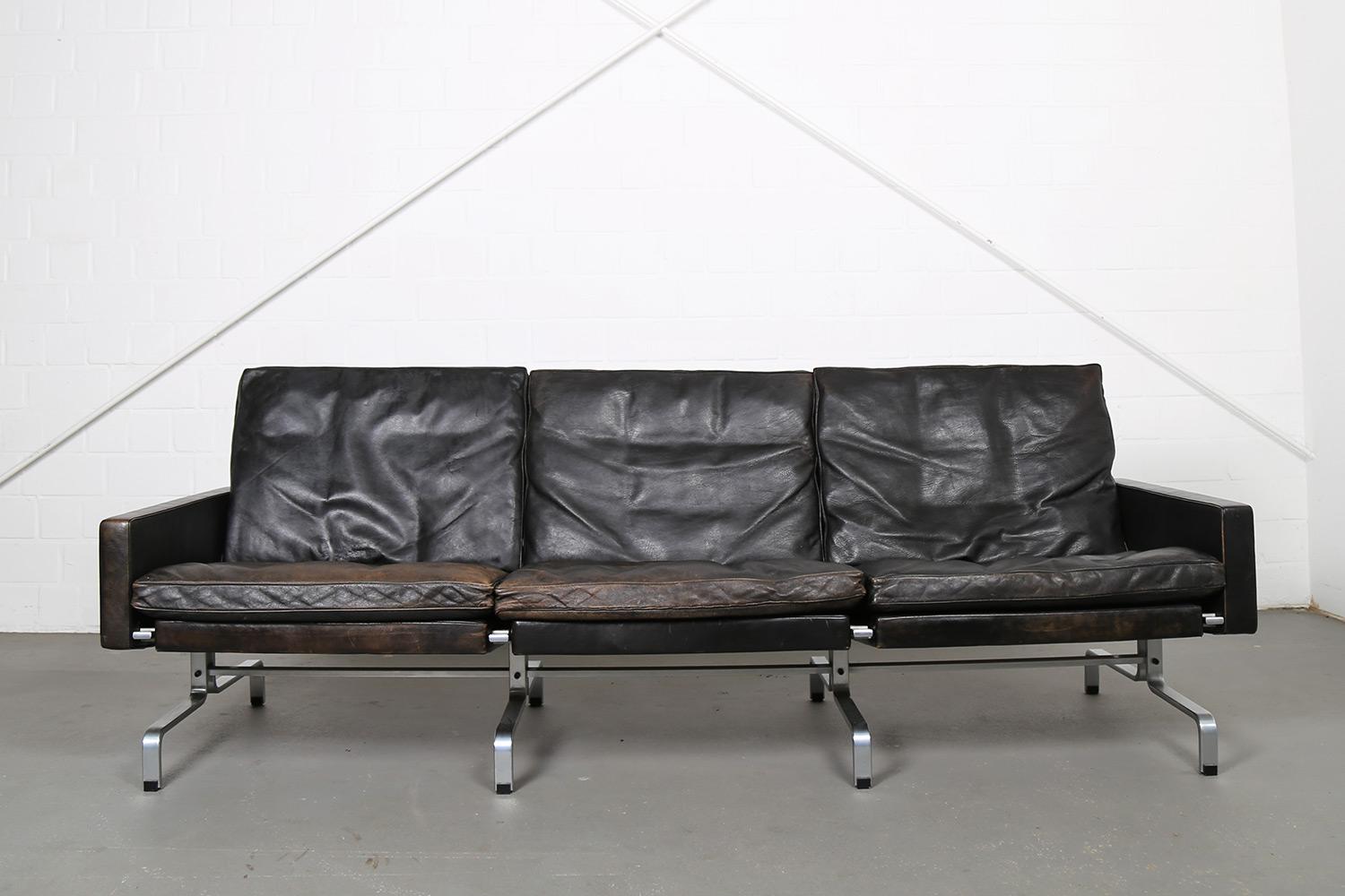 Beautiful, black sofa designed by Poul Kjærholm for E. Kold Christensen in Denmark, 1958. The model is named “PK 31/3”, corresponding to the 3-seater sofa. The sofa has a beautiful patina from the years of usage. Nevertheless, everything has been