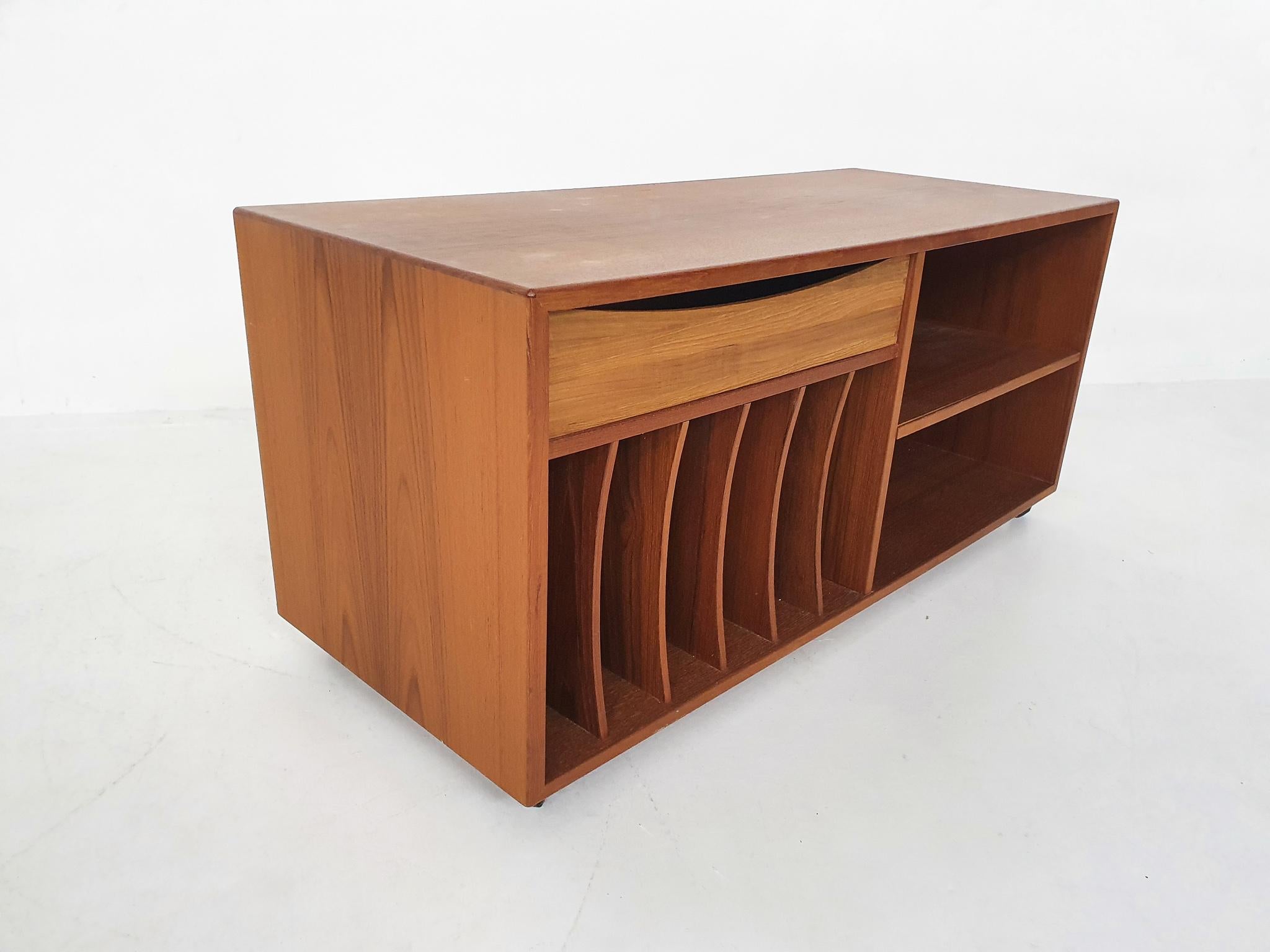 Teak credenza for an audio set. This is quite a rare item, since high end furniture for audio devices were not the most made and bought items in the mid-century.

This item is an unique change to own a beautiful designed Danish piece of furniture