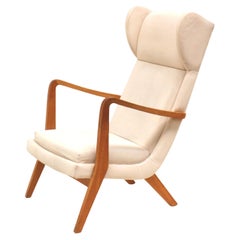 Danish design vintage armchair with cream upholstery from the 70s