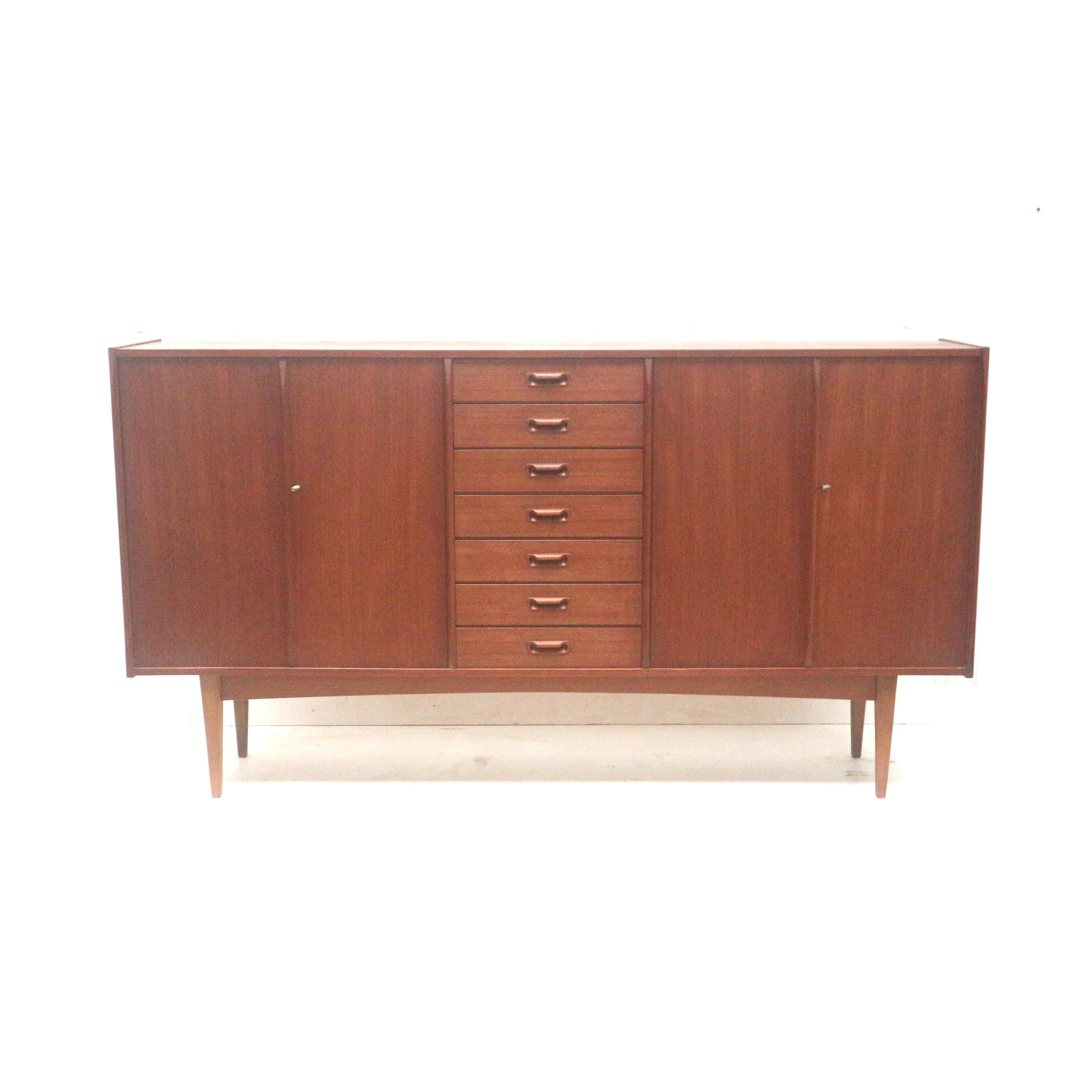 Scandinavian Modern Danish design vintage sideboard made of teak from the 1960s For Sale