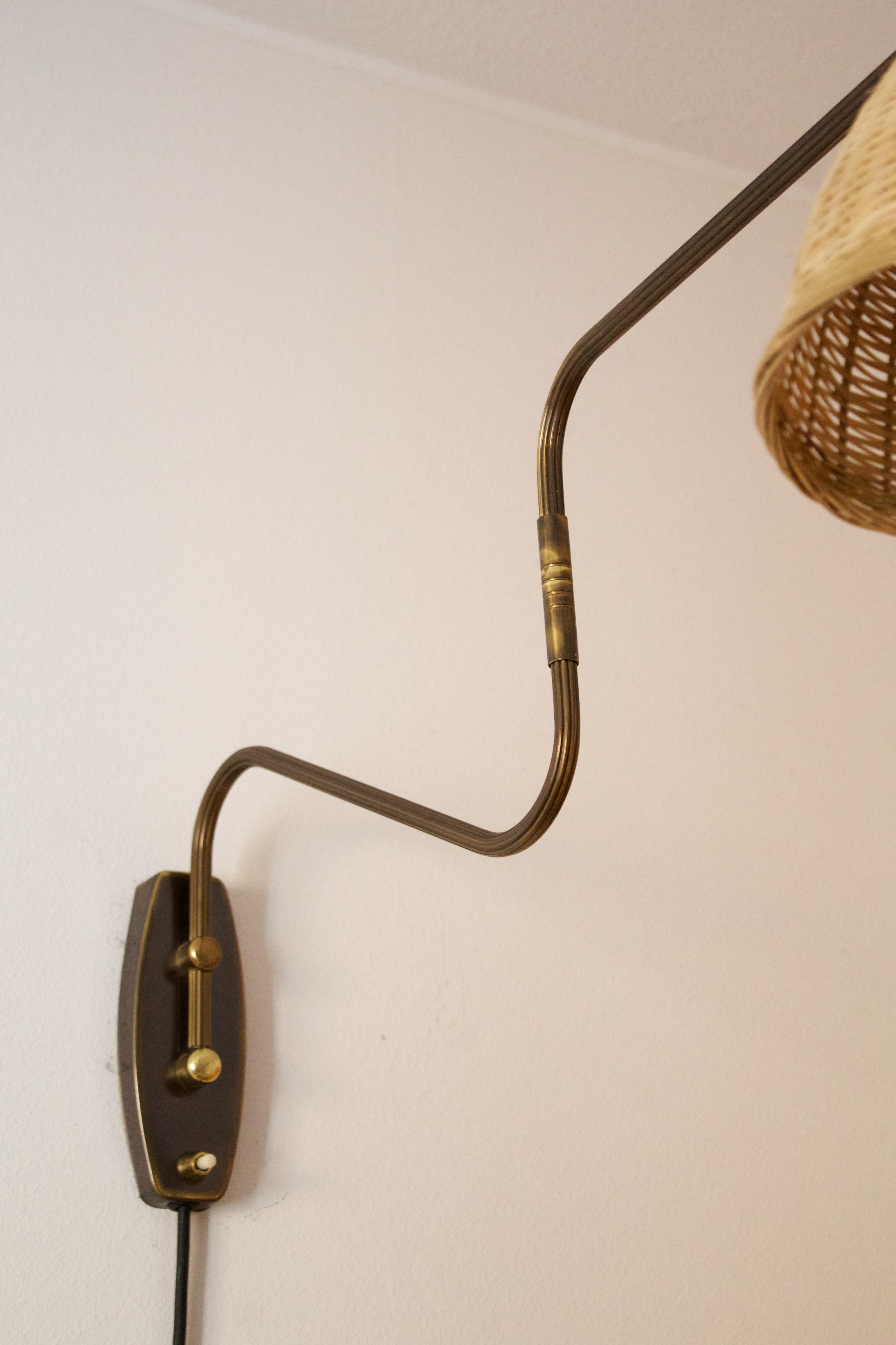 Danish Designer, Adjustable Wall Light, Brass, Metal, Rattan, Denmark, 1940s In Good Condition In High Point, NC