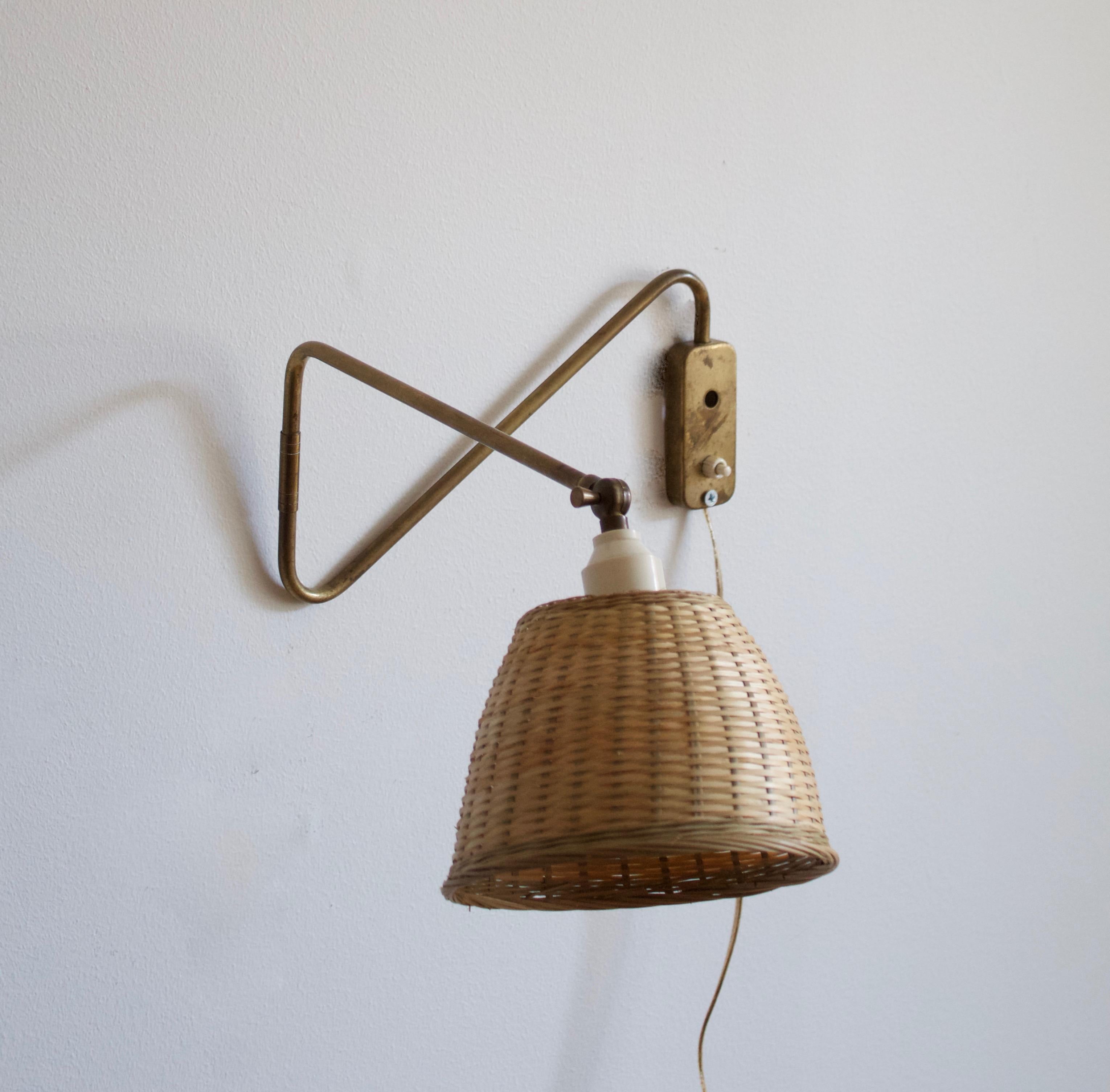 Scandinavian Modern Danish Designer, Adjustable Wall Light, Brass, Rattan, Denmark, 1940s