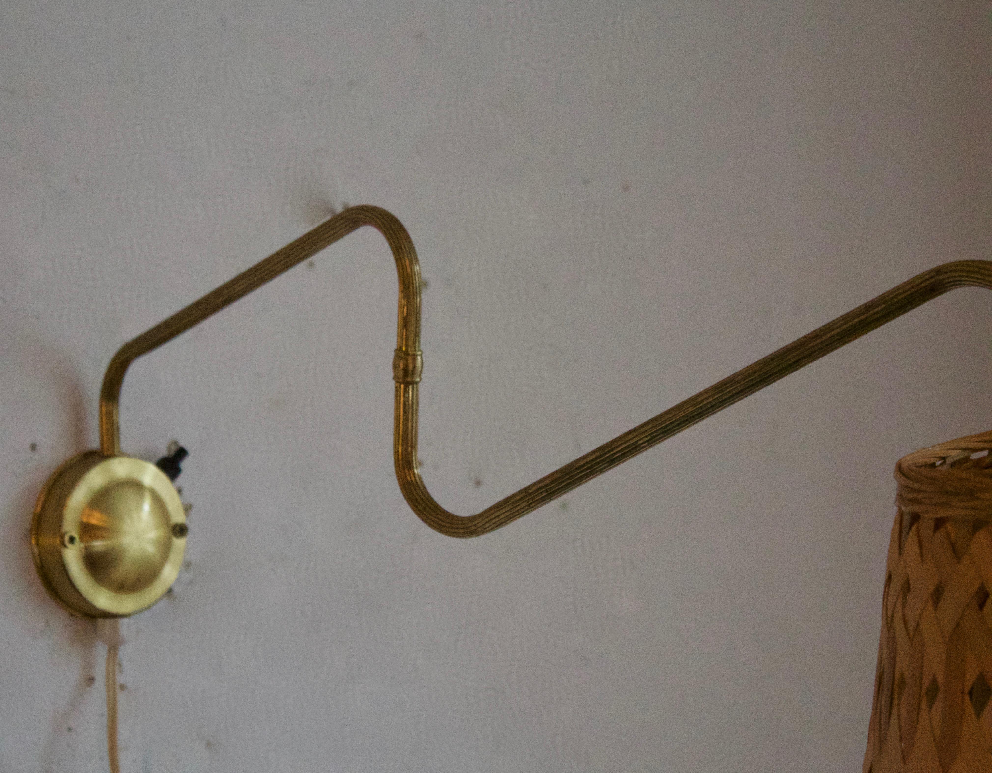Scandinavian Modern Danish Designer, Adjustable Wall Light, Brass, Rattan, Denmark, 1950s