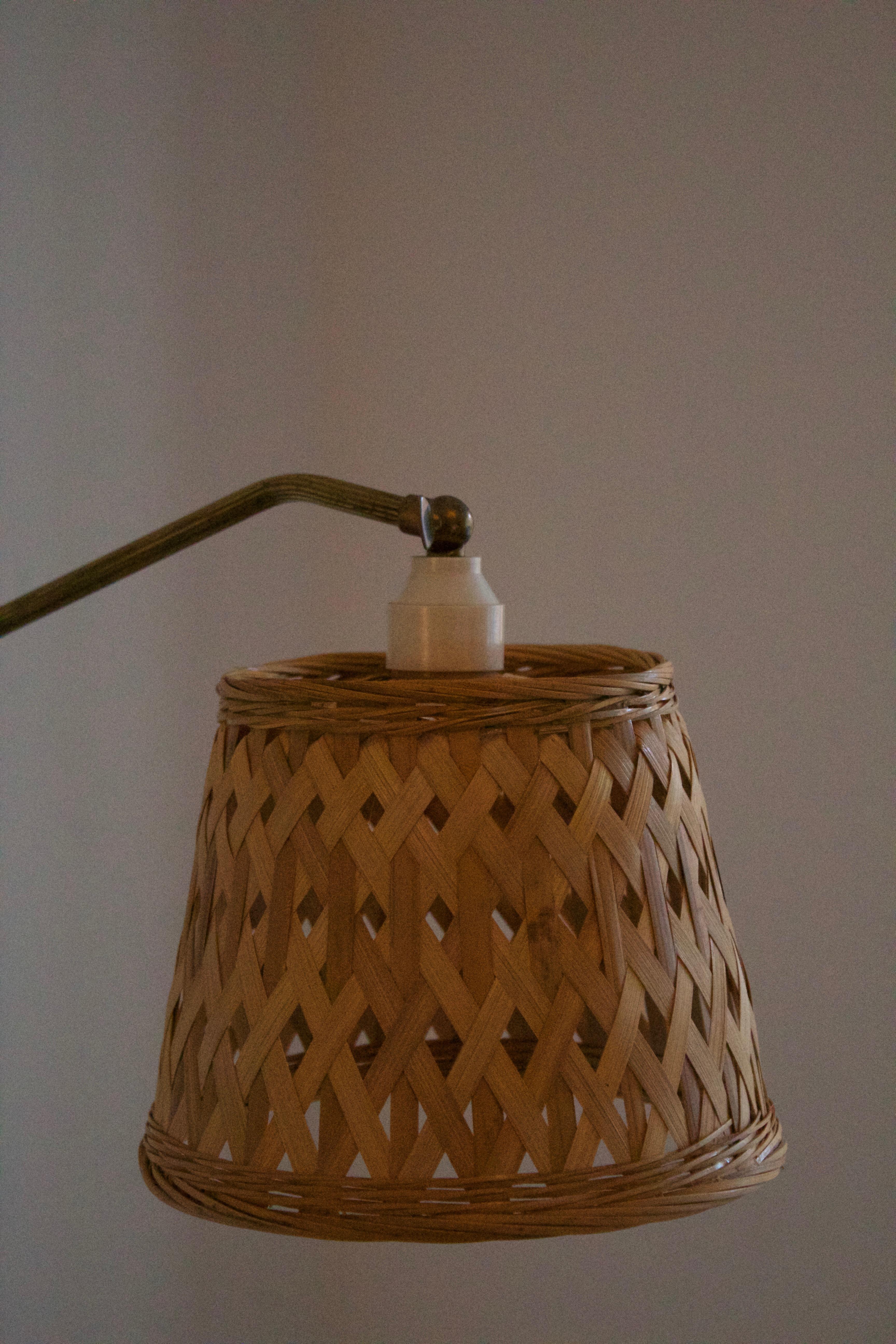 Danish Designer, Adjustable Wall Light, Brass, Rattan, Denmark, 1950s In Good Condition In High Point, NC