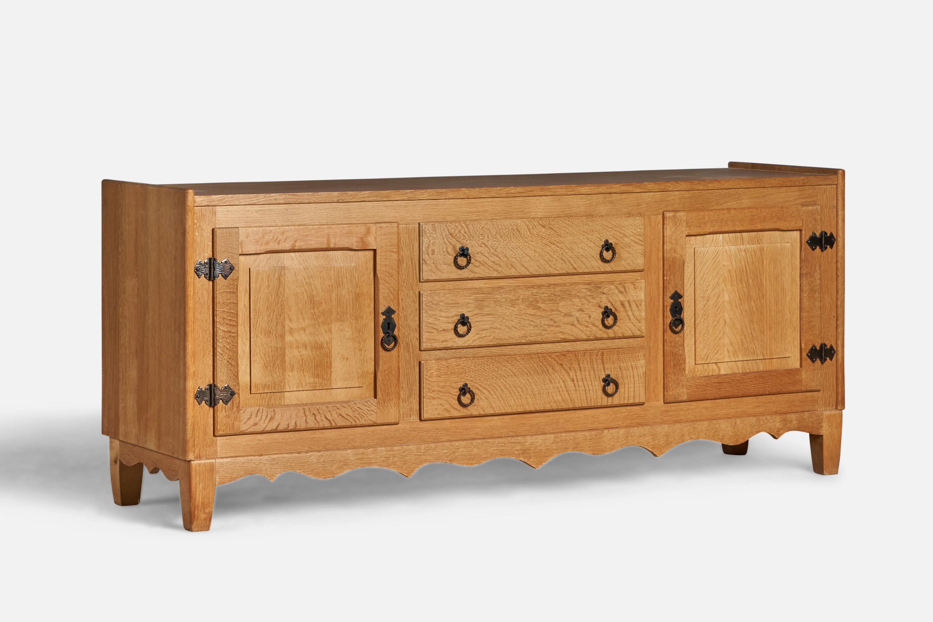 An oak and metal cabinet designed and produced in Denmark, c. 1950s.