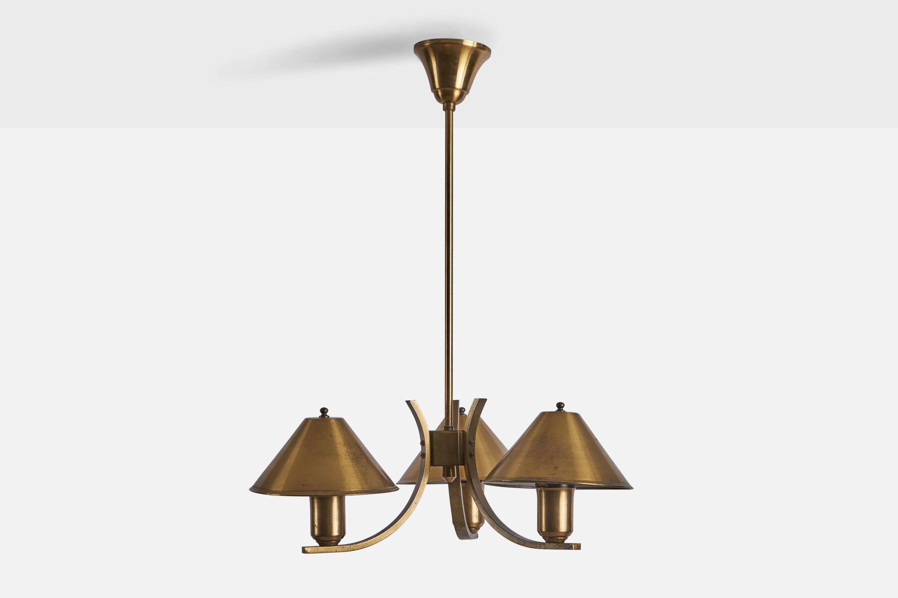 A three-armed brass chandelier designed and produced in Denmark, c. 1940s.

Overall Dimensions (inches): 23.5” H x 18” Diameter
Bulb Specifications: E-26 Bulb
Number of Sockets: 3
