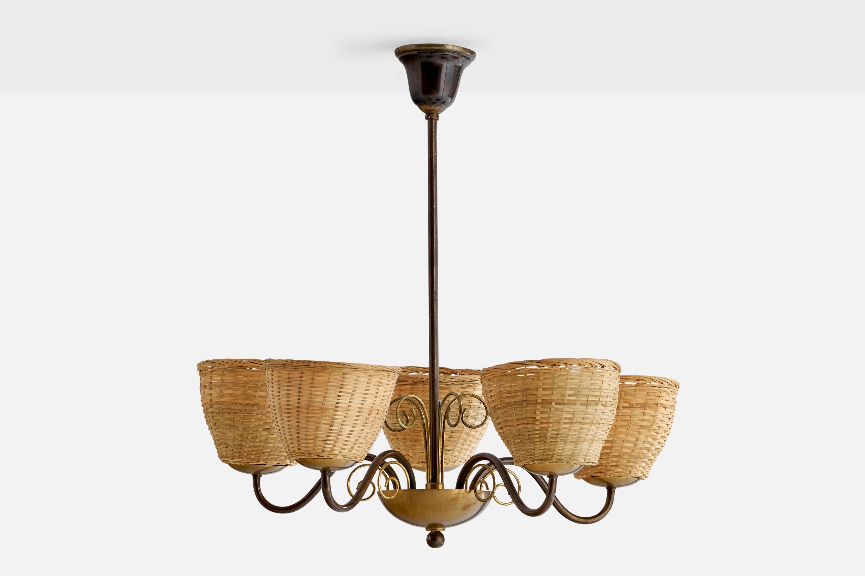 A five-armed brass and rattan chandelier designed and produced in Denmark, 1940s.

Dimensions of canopy (inches): 3.25” H x 4.25” Diameter
Socket takes standard E-26 bulbs. 5 sockets.There is no maximum wattage stated on the fixture. All lighting