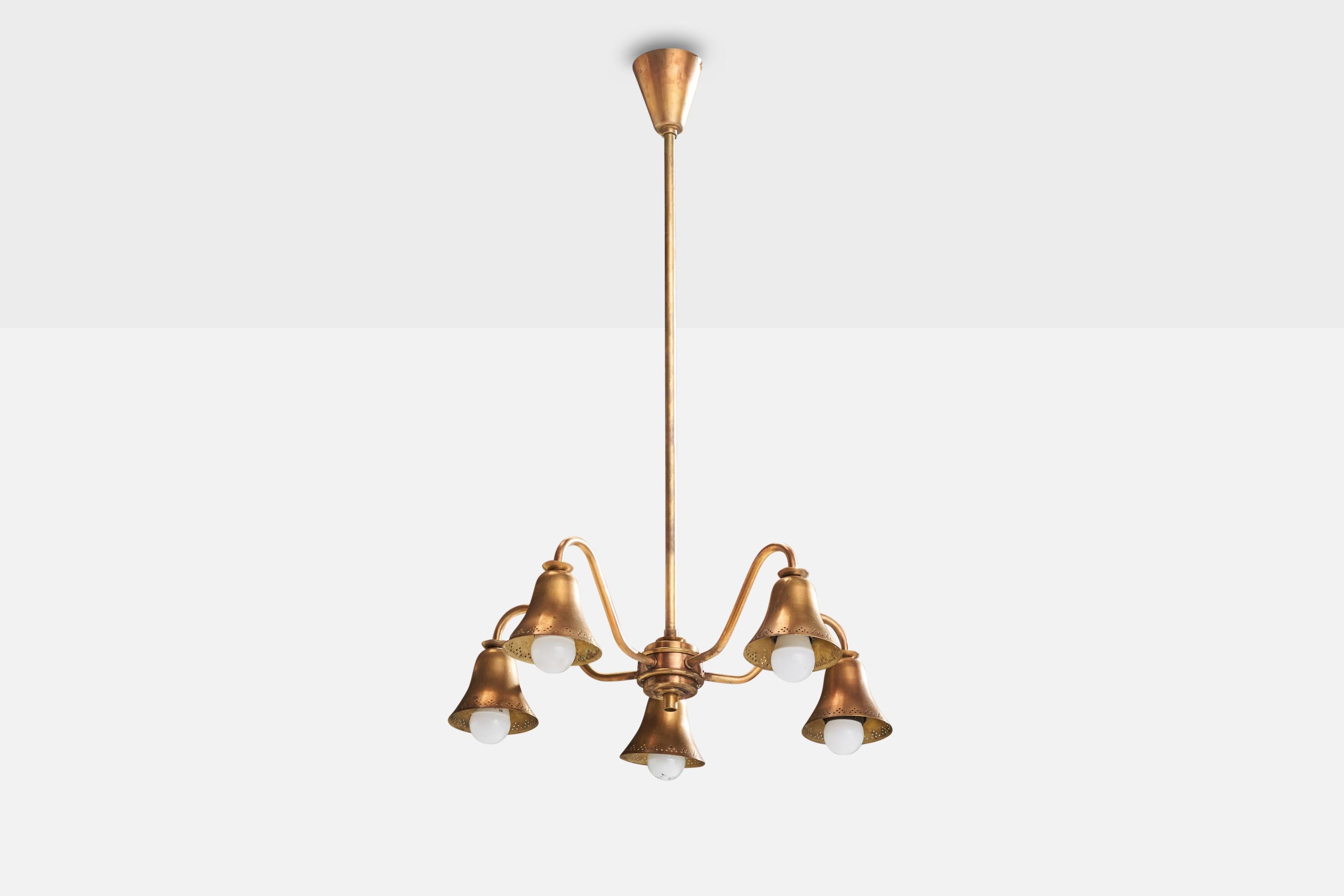 A copper chandelier designed and produced in Denmark, 1940s.

Dimensions of canopy (inches) : 3.51” H x 3.4” Diameter
Socket takes standard E-26 bulbs. 5 sockets.There is no maximum wattage stated on the fixture. All lighting will be converted for