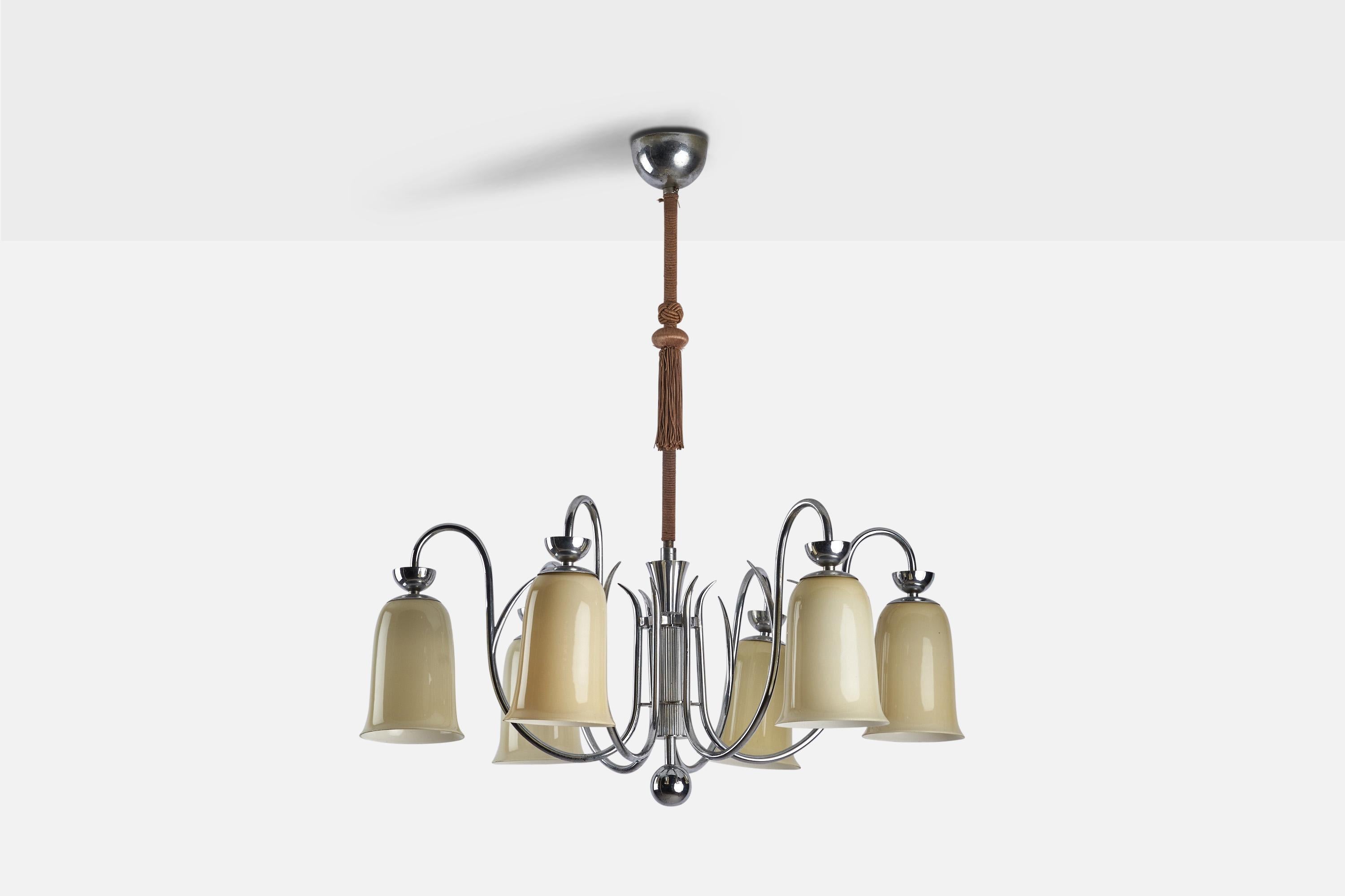 
A steel, beige opaline glass and brown cord chandelier designed and produced in Denmark, 1930s.
Dimensions of canopy (inches) : 2.39” H x 3.65” Diameter
Socket takes standard E-26 bulbs. 6 sockets.There is no maximum wattage stated on the fixture.