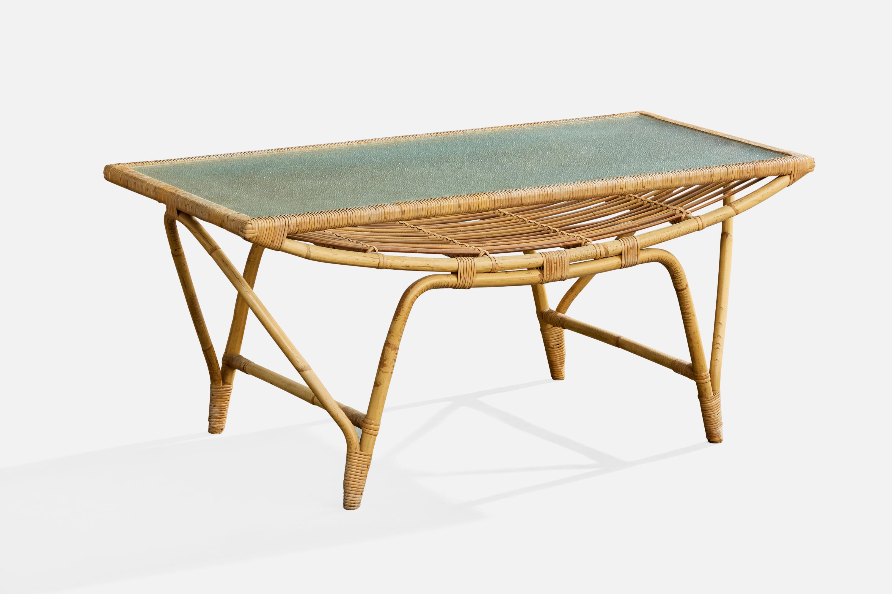 A bamboo, rattan and glass coffee table designed and produced in Denmark, c. 1950s.

Moderate to heavy wear to rattan.

Patina buildup between rattan of tabletop edges.

Overall Dimensions (inches): 19.75