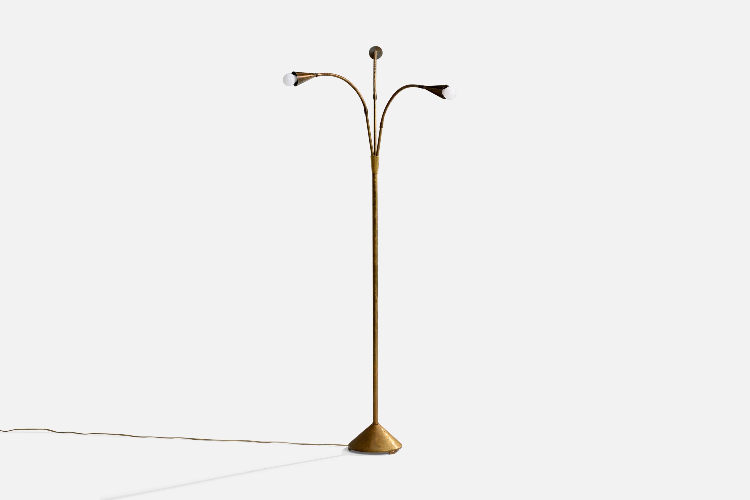 An adjustable brass floor lamp designed and produced in Denmark, c. 1940s.

Dimensions of Lamp (inches): 56.0
