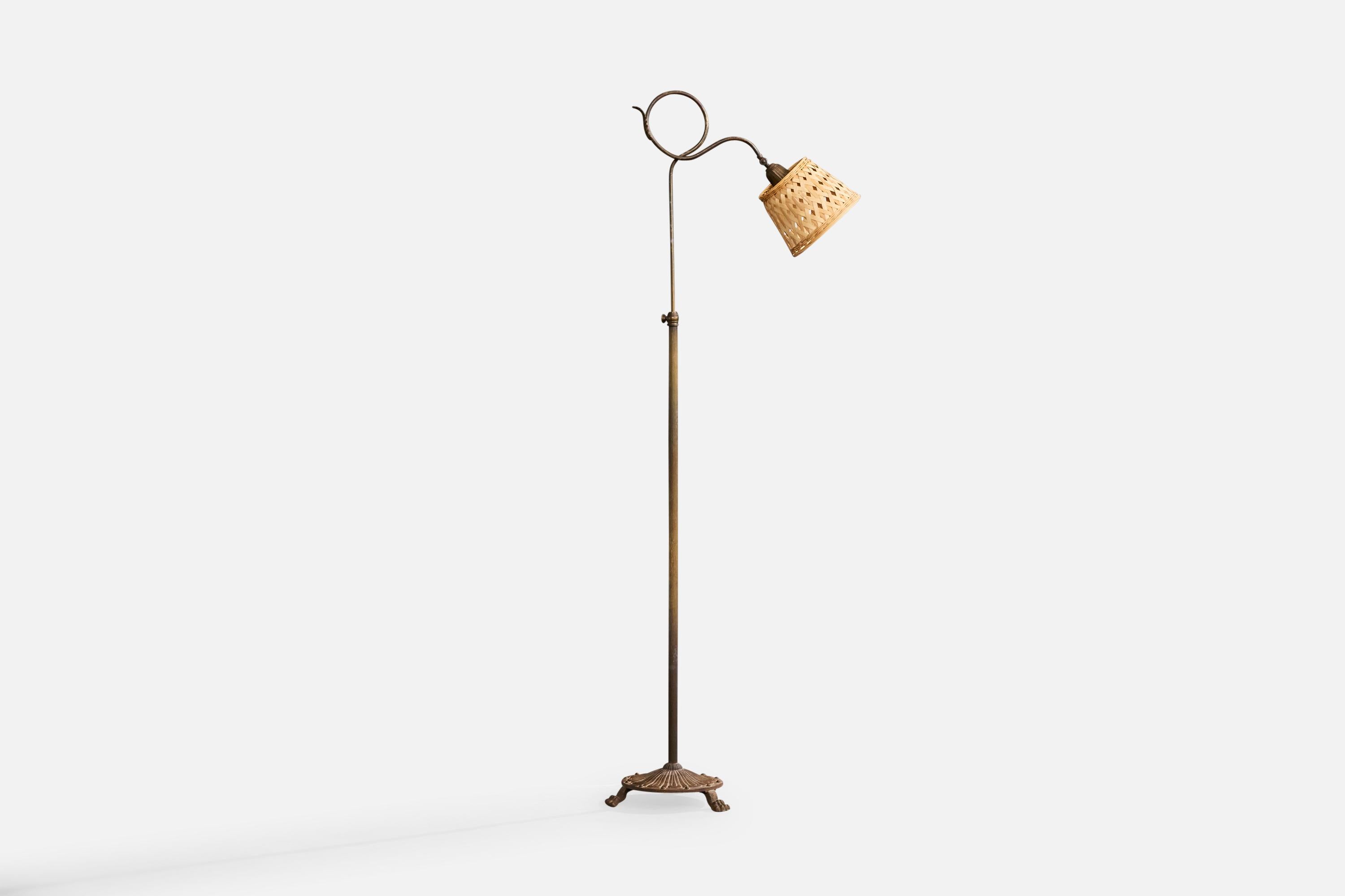 Lámpara de pie regulable de latón y ratán, probablemente diseñada y fabricada en Dinamarca, c. 1930.

Dimensiones de la lámpara (pulgadas): 63,0 