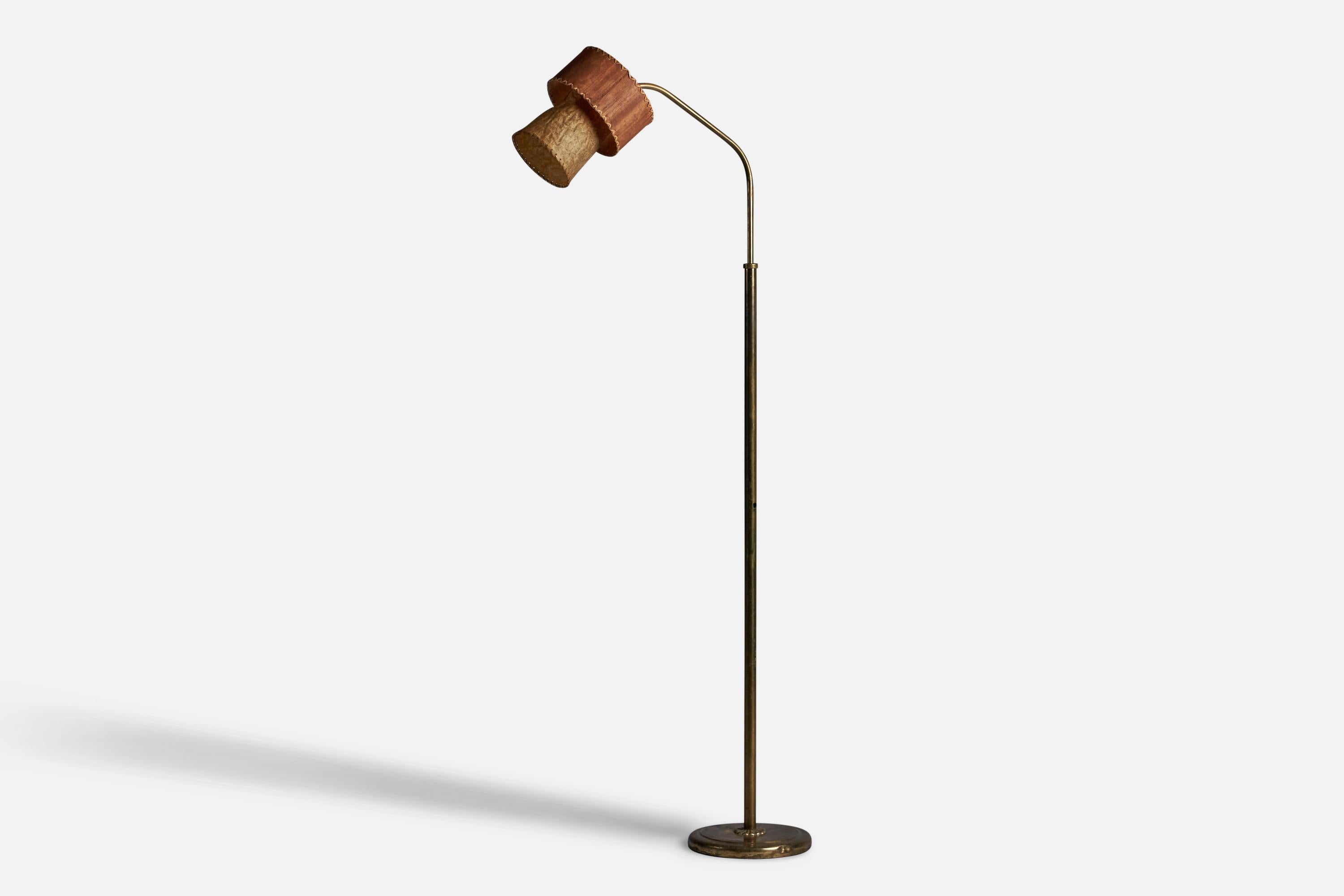 An adjustable brass, wood veneer, and paper floor lamp designed and produced in Denmark, c. 1930s.

Overall Dimensions (inches): 63” H x 9.75” W x 26” D
Bulb Specifications: E-26 Bulb
Number of Sockets: 1
